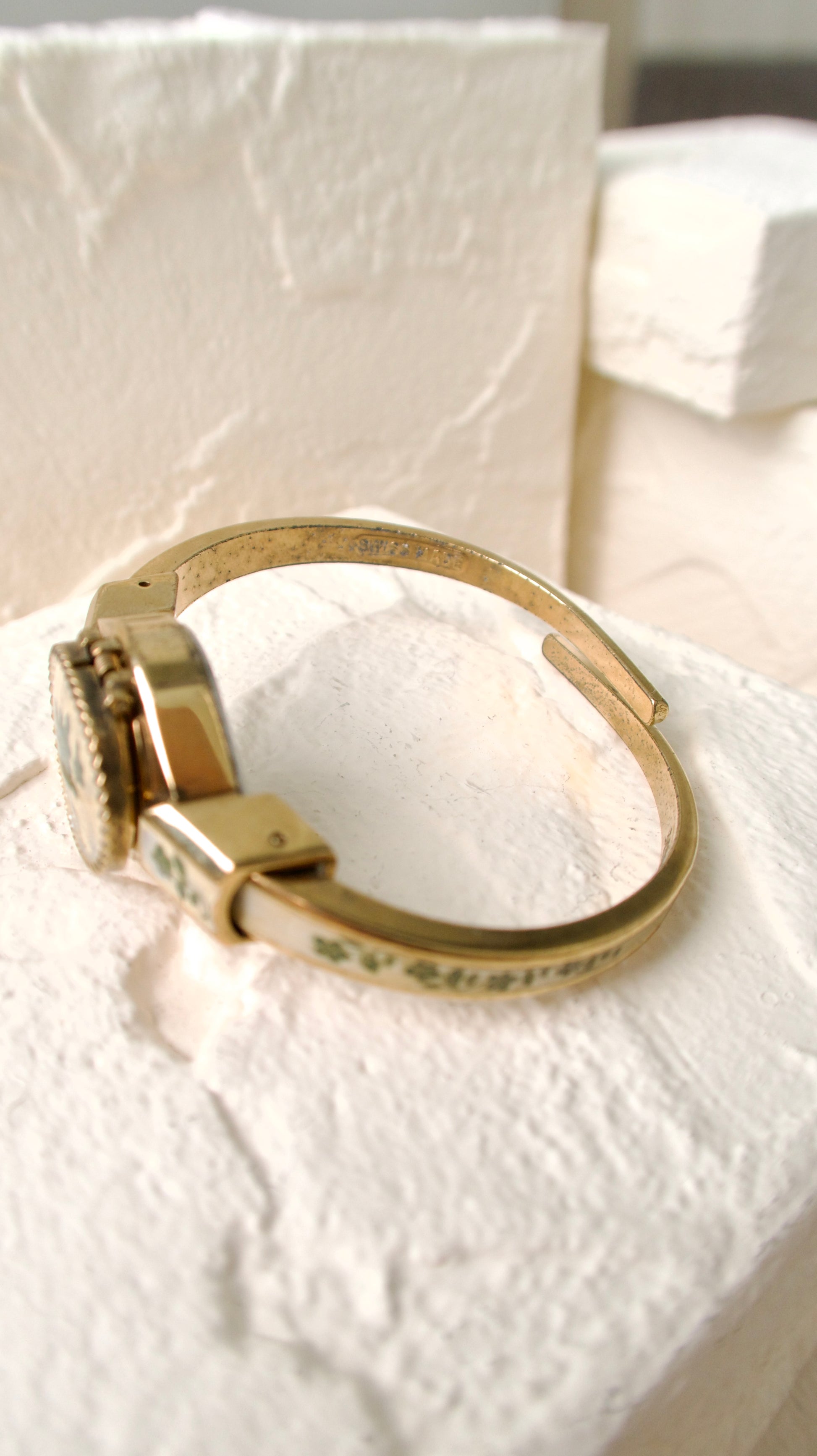 A.M. Beige Blue Floral Pattern Gold Bangle Watch