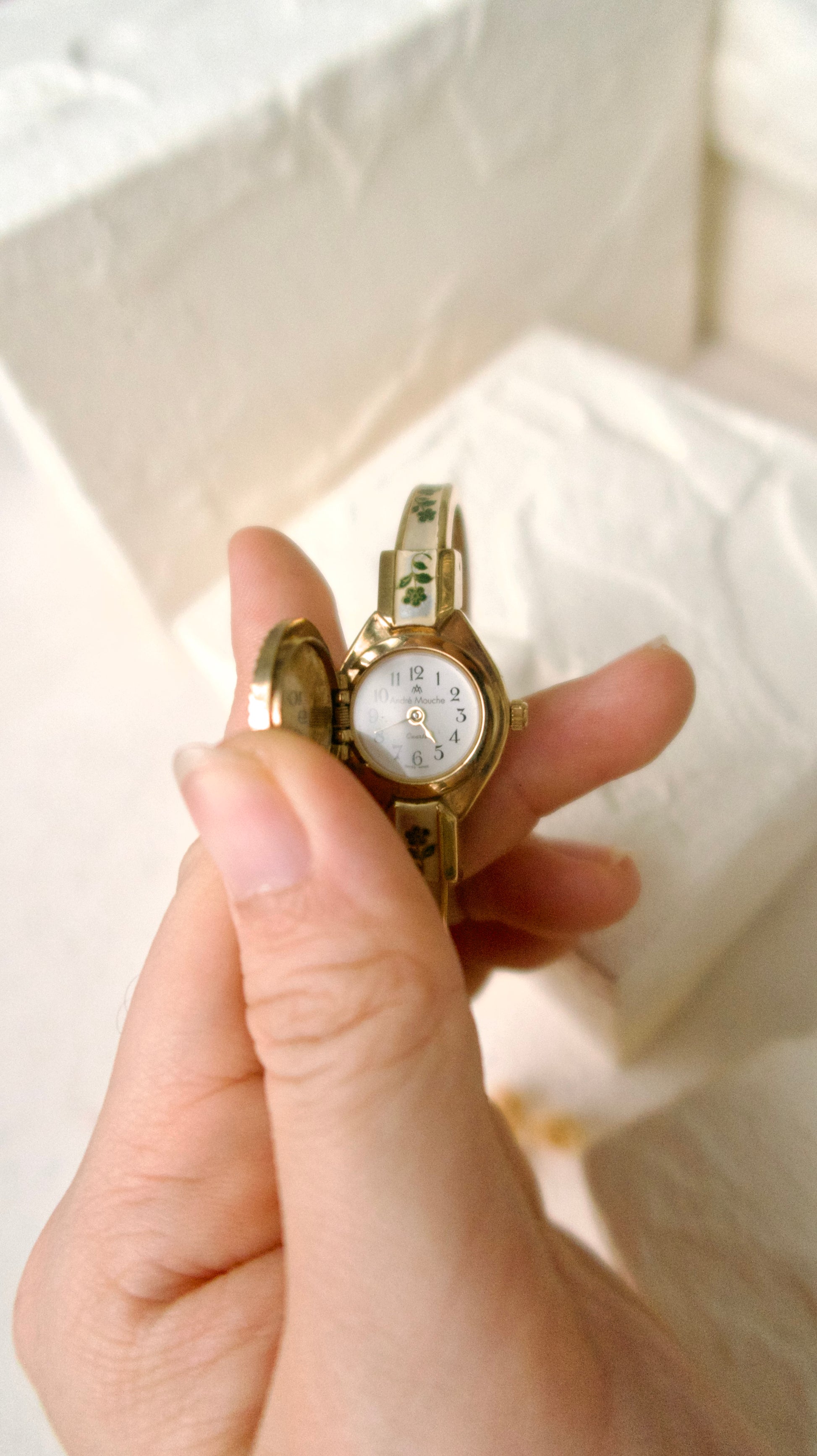 A.M. Beige Blue Floral Pattern Gold Bangle Watch