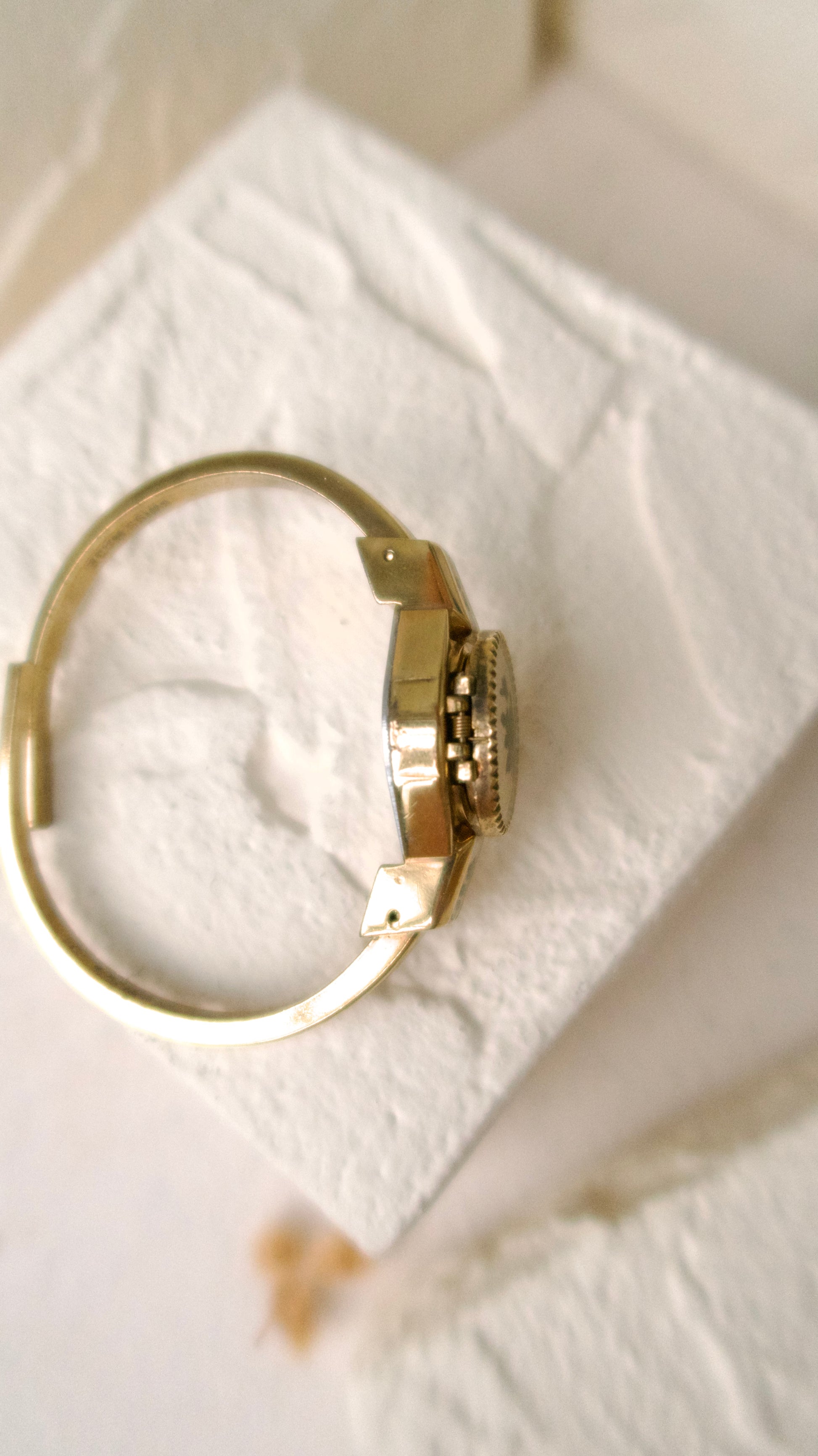 A.M. Beige Blue Floral Pattern Gold Bangle Watch