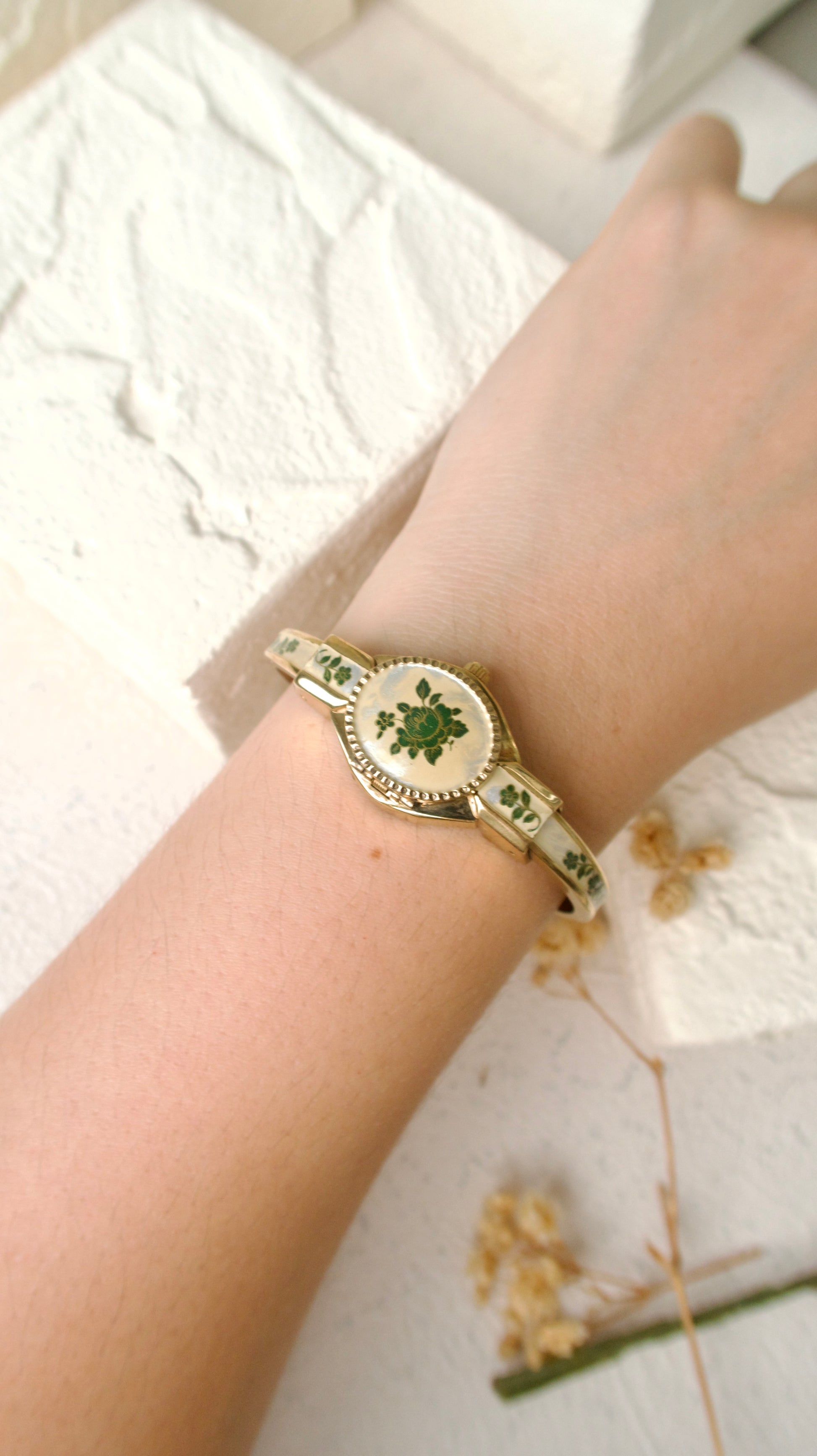 A.M. Beige Blue Floral Pattern Gold Bangle Watch