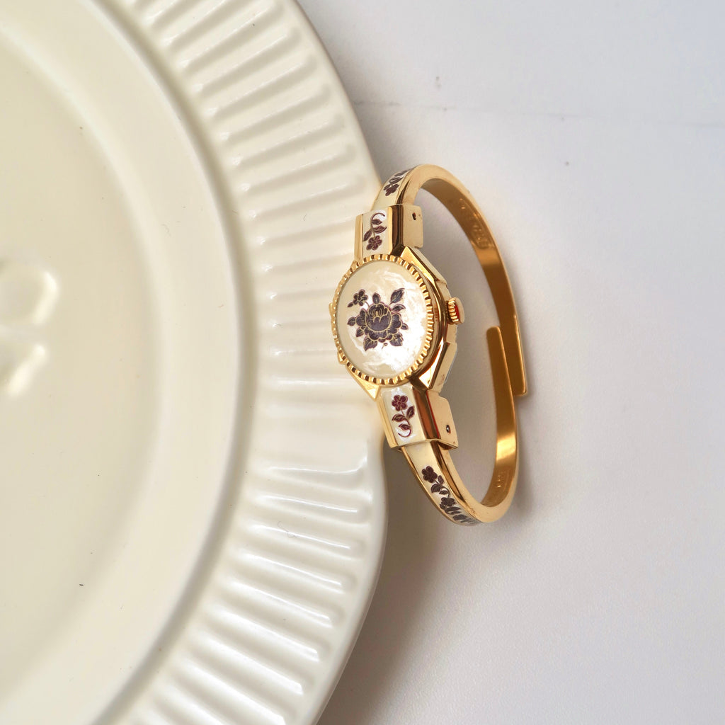 AM. Beige Red Flower Pattern Gold Bangle Watch