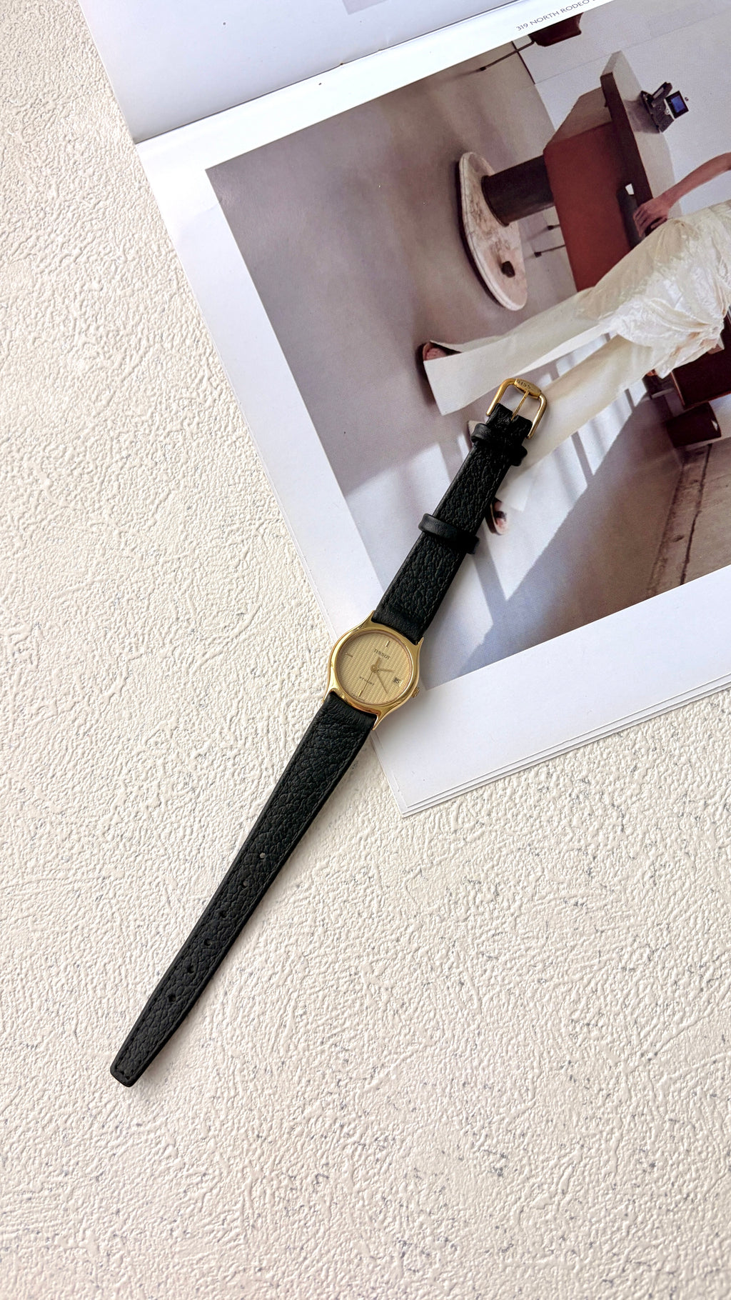 T. Stylist Gold Round Date Dial Black Strap Watch