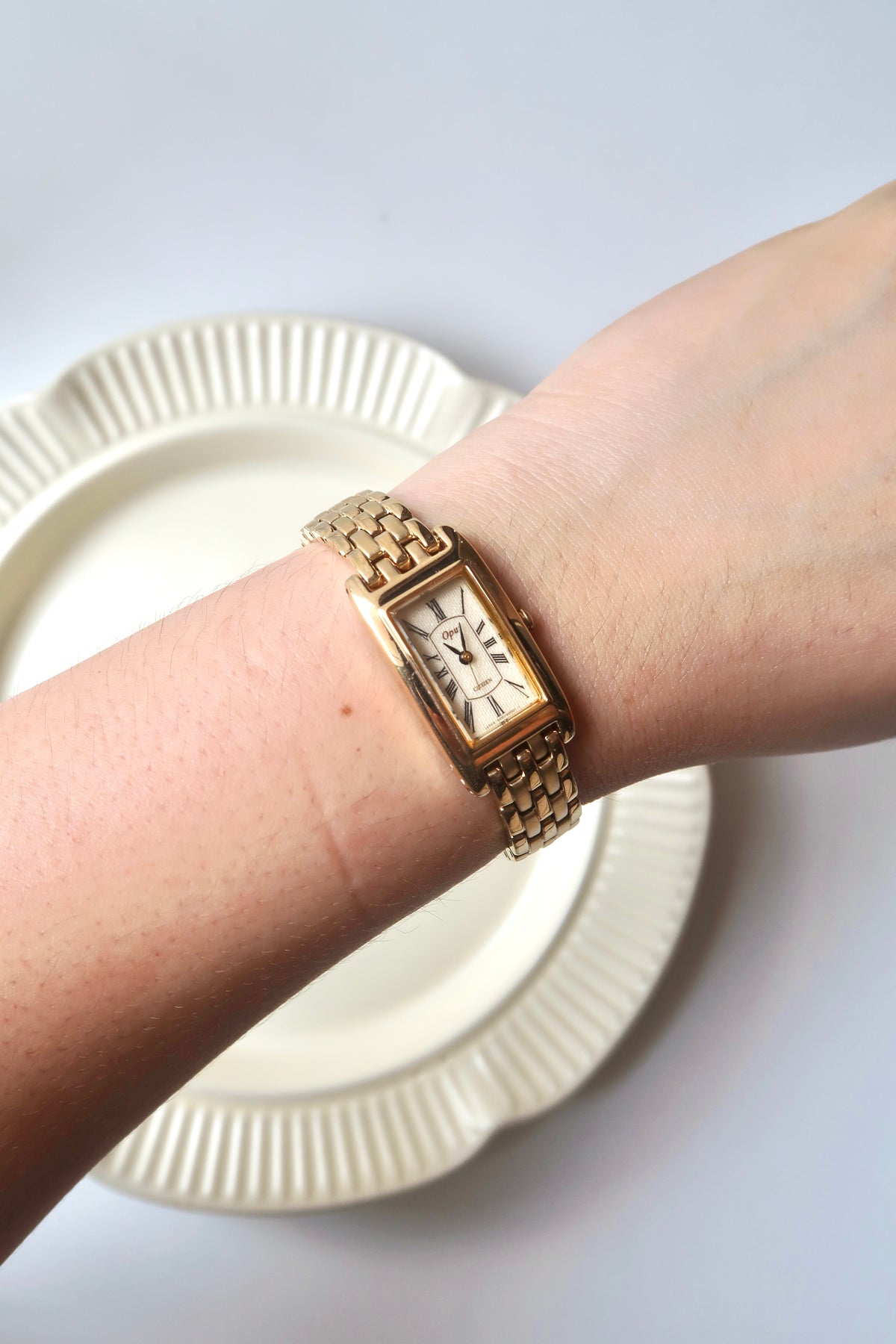 CTZ. Opus Beige Roman Rect Dial Gold Chain Watch