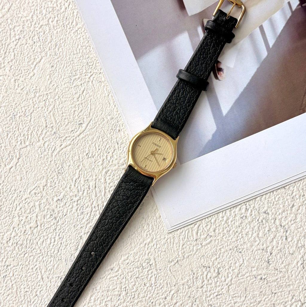 T. Stylist Gold Round Date Dial Black Strap Watch
