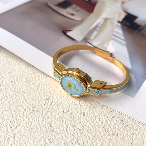 AM. Blue Flower Pattern Gold Bangle Watch