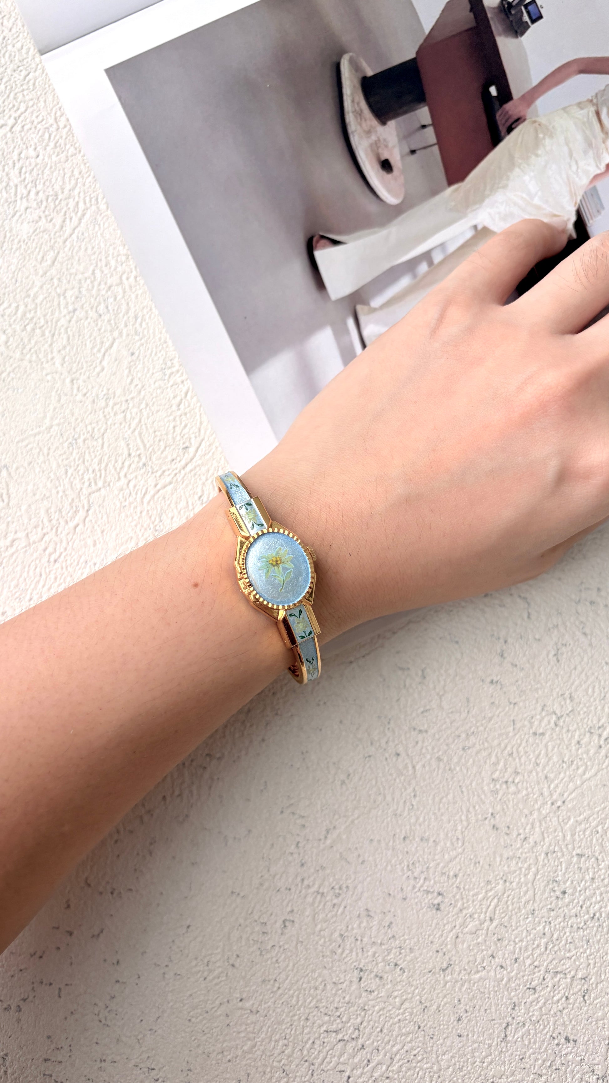 AM. Blue Flower Pattern Gold Bangle Watch