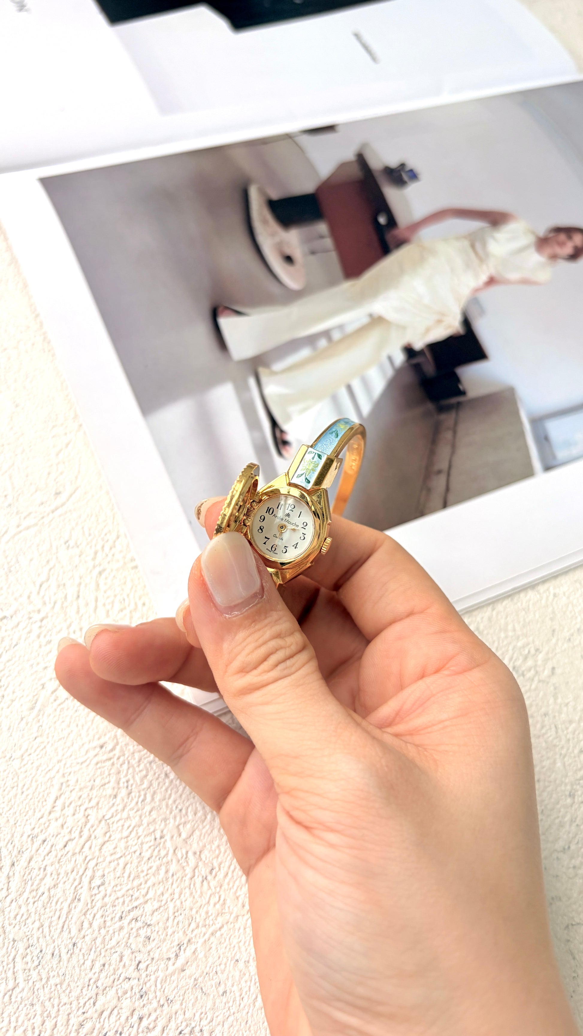 AM. Blue Flower Pattern Gold Bangle Watch