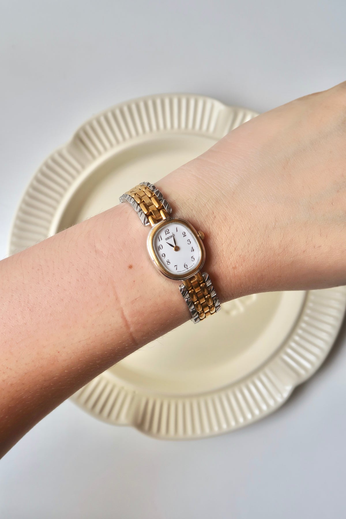 S. White Oval Dial Two Tone Chain Watch