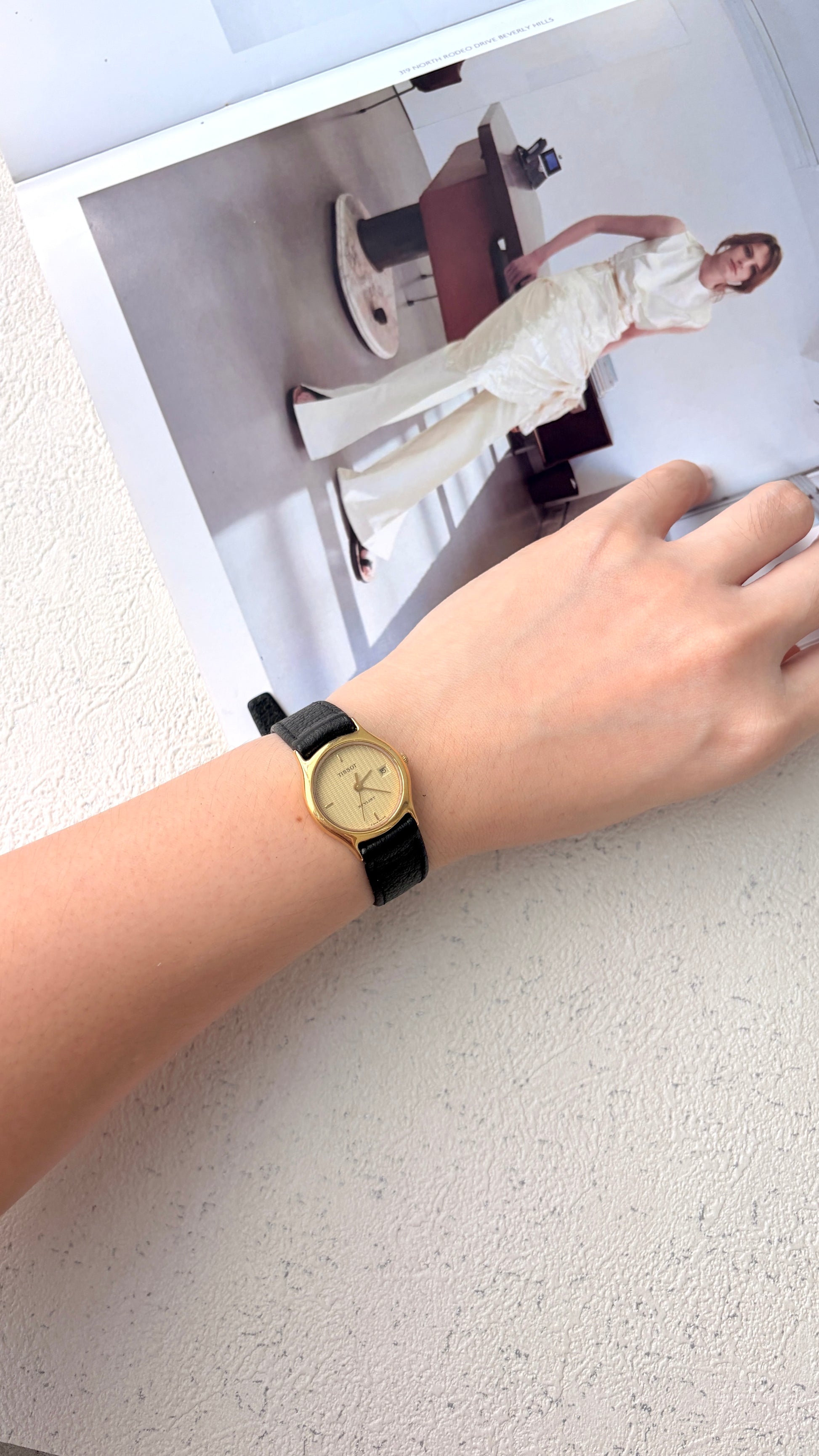 T. Stylist Gold Round Date Dial Black Strap Watch