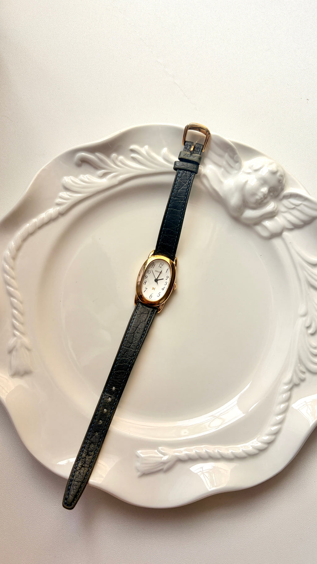 S. Noie White Oval Dial Black Strap Watch
