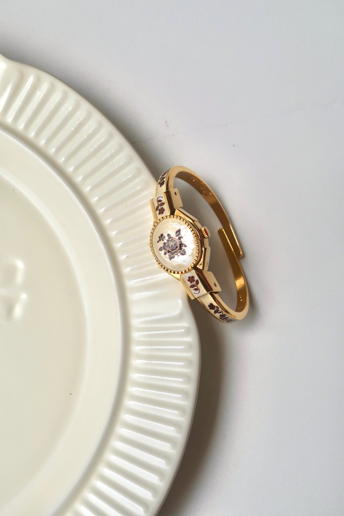 AM. Beige Red Flower Pattern Gold Bangle Watch