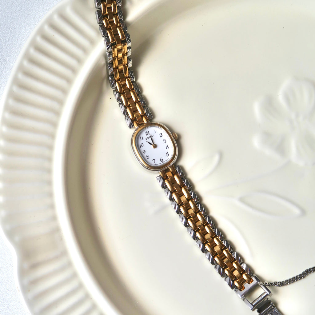 S. White Oval Dial Two Tone Chain Watch