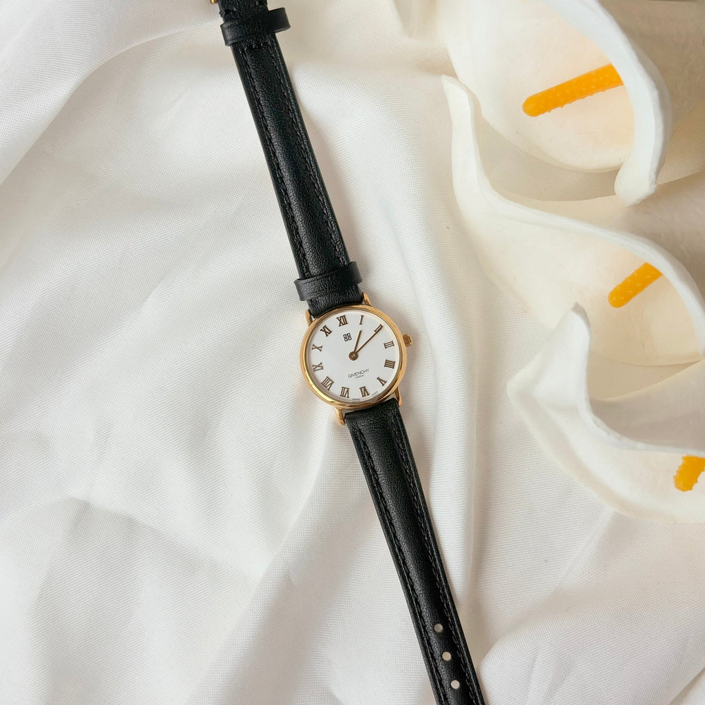 GV. White Round Roman Dial Black Strap Watch