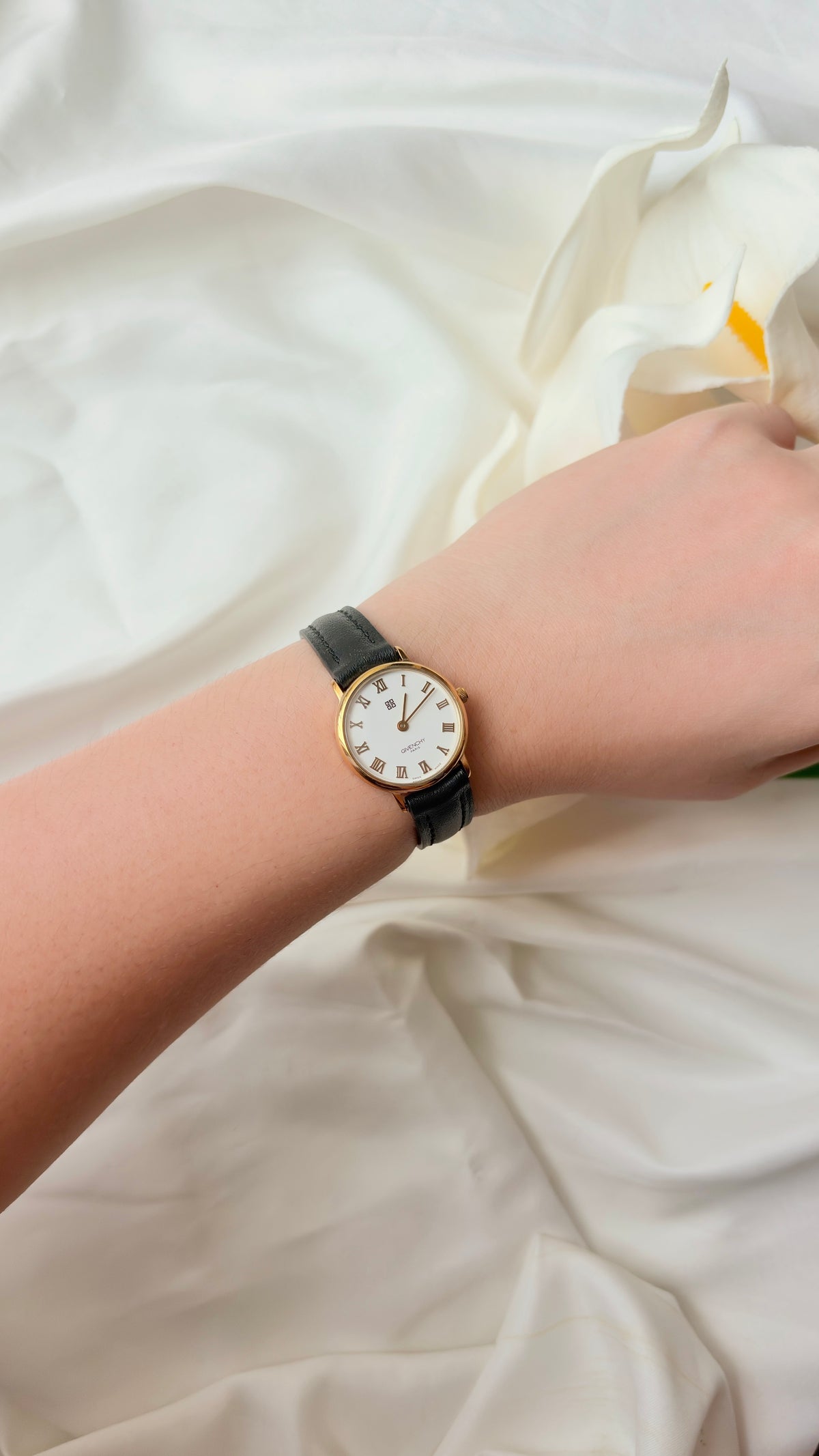 GV. White Round Roman Dial Black Strap Watch