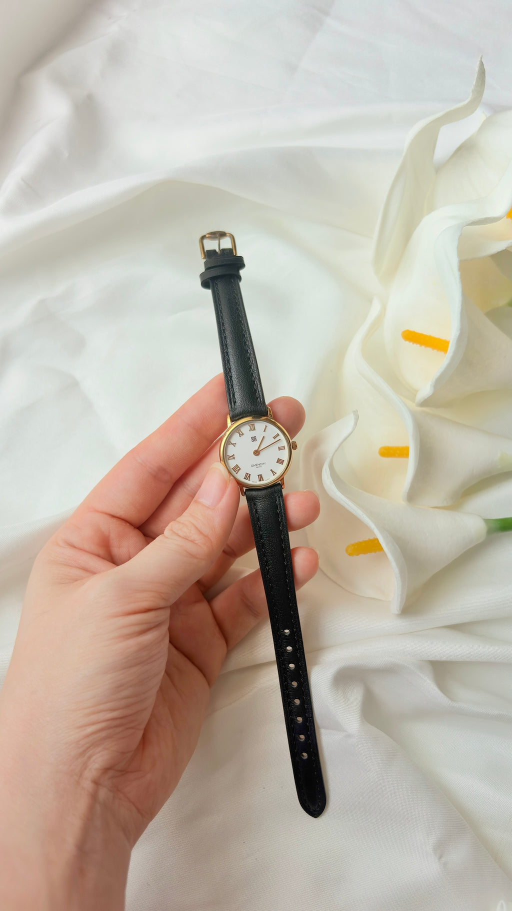 GV. White Round Roman Dial Black Strap Watch