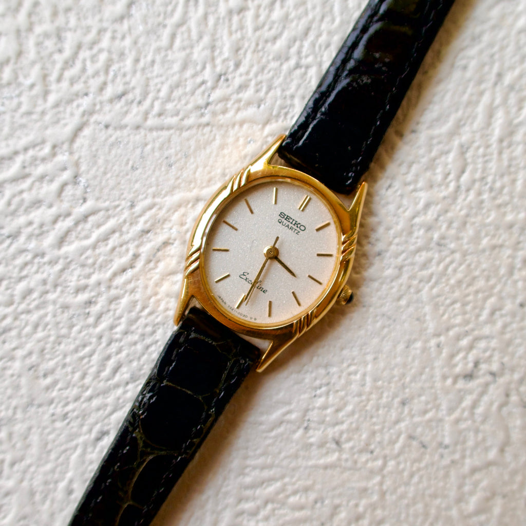 S. Exceline Oval Gold Dial with Black Strap