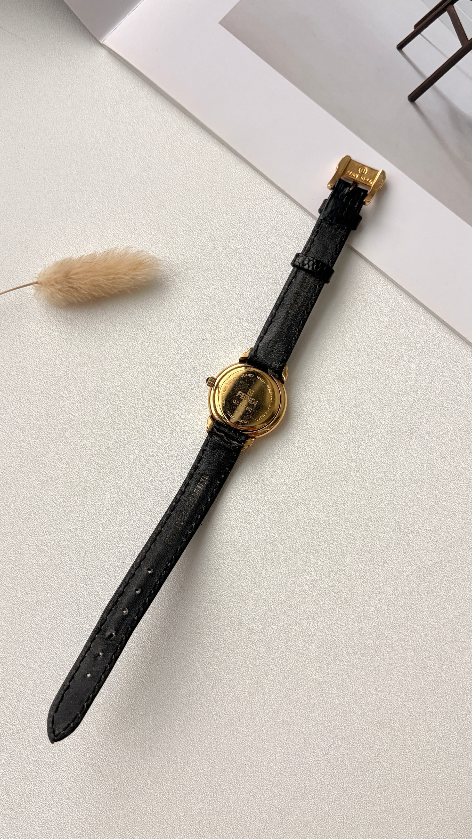 F. 300L White Round Dial Black Strap Watch