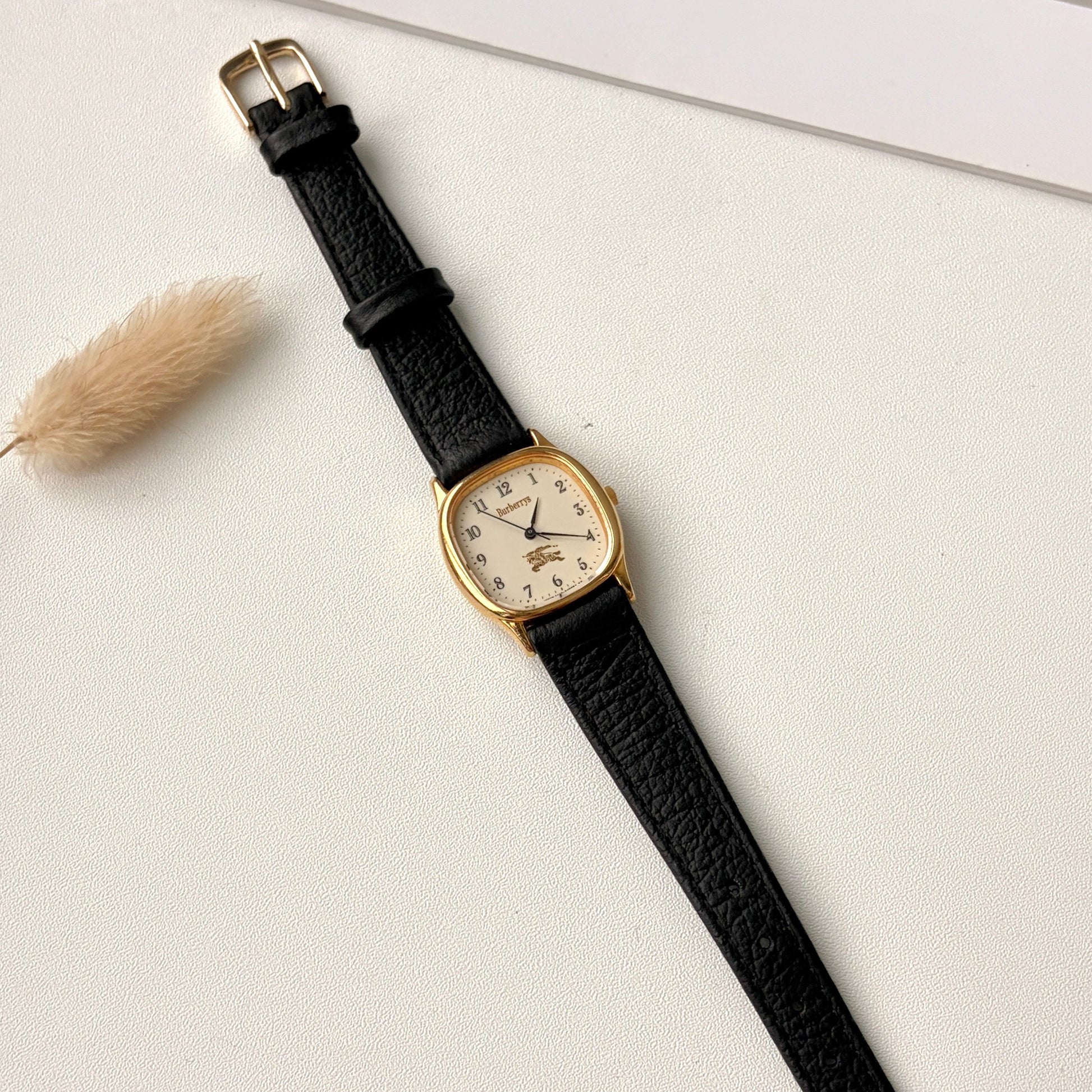 BRBY. Beige Numeric Square Dial Black Strap Watch