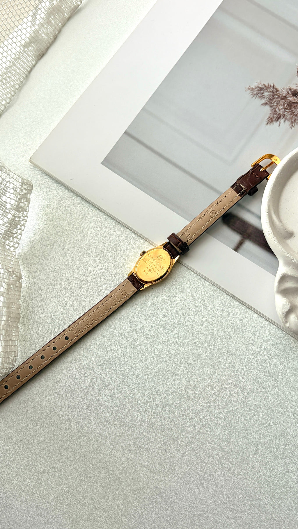RW. White Oval Dial Brown Strap Watch