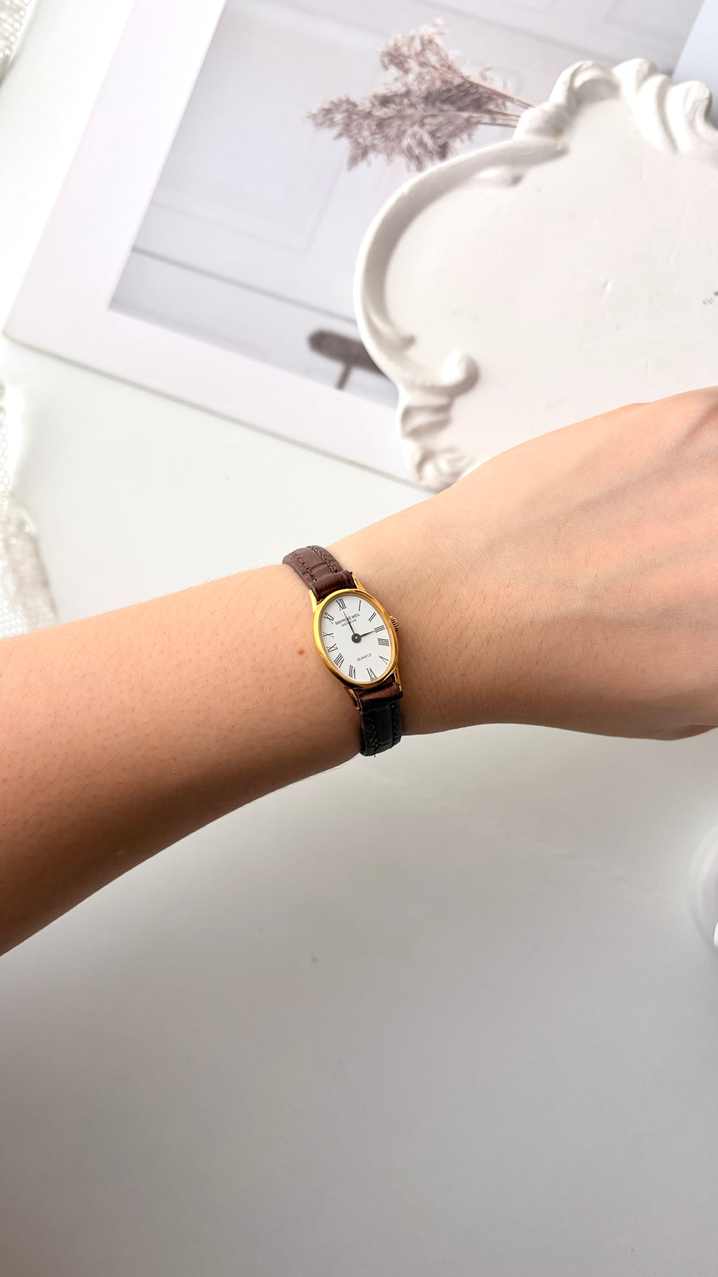 RW. White Oval Dial Brown Strap Watch