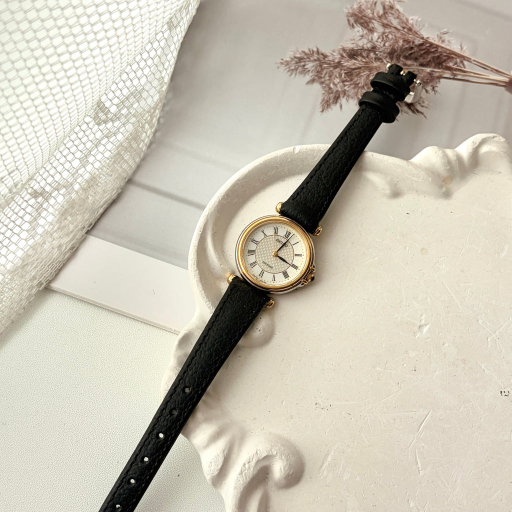 S. Exceline White Round Pattern Roman Dial Black Strap Watch