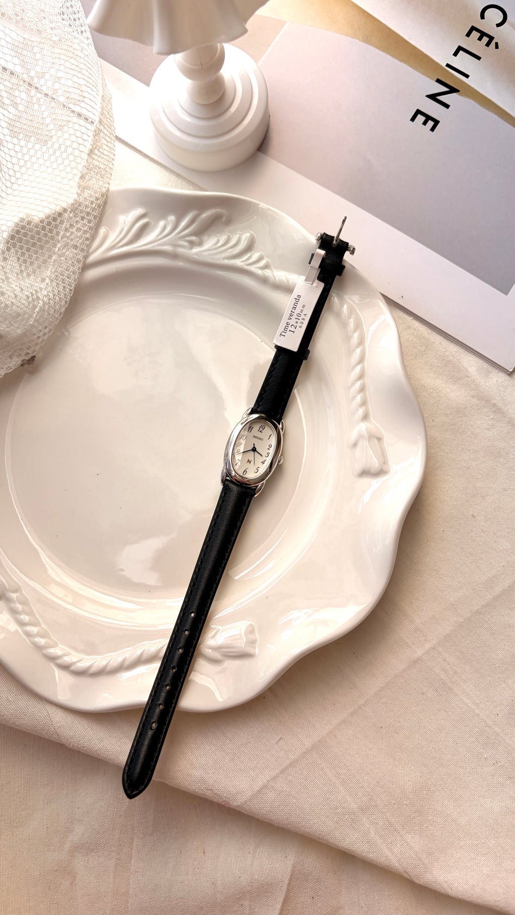 S. Noie White Oval Dial Black Strap Watch