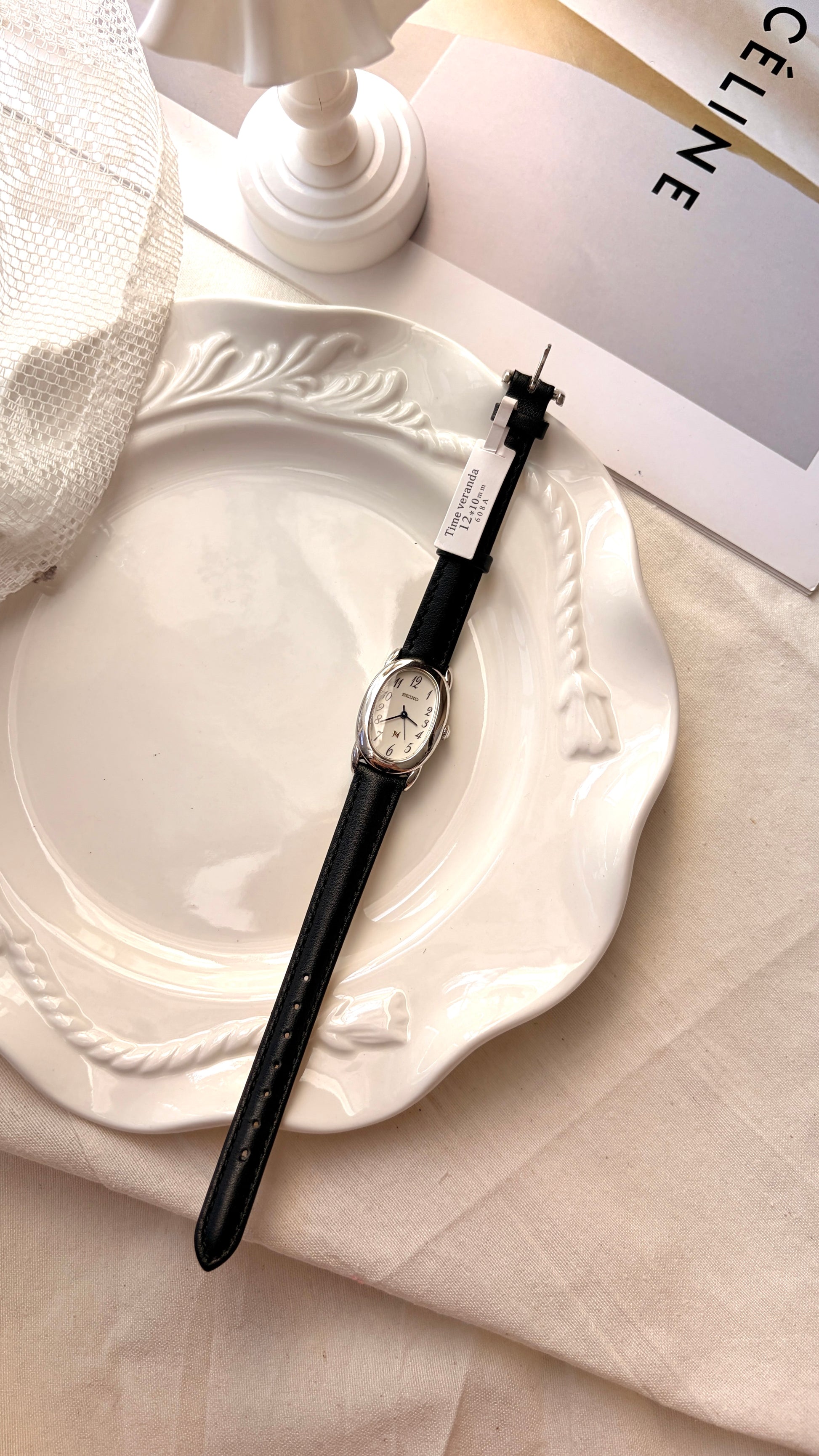 S. Noie White Oval Dial Black Strap Watch