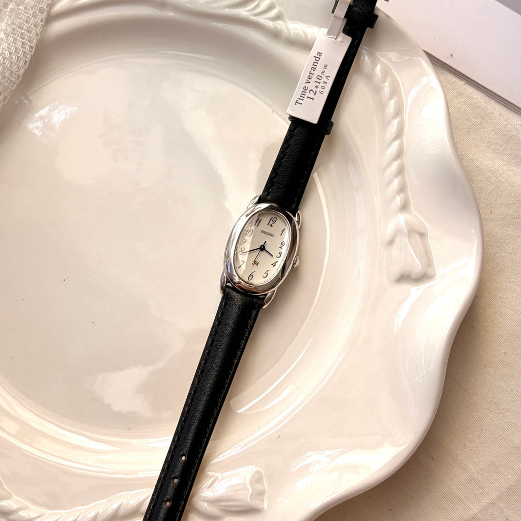 S. Noie White Oval Dial Black Strap Watch