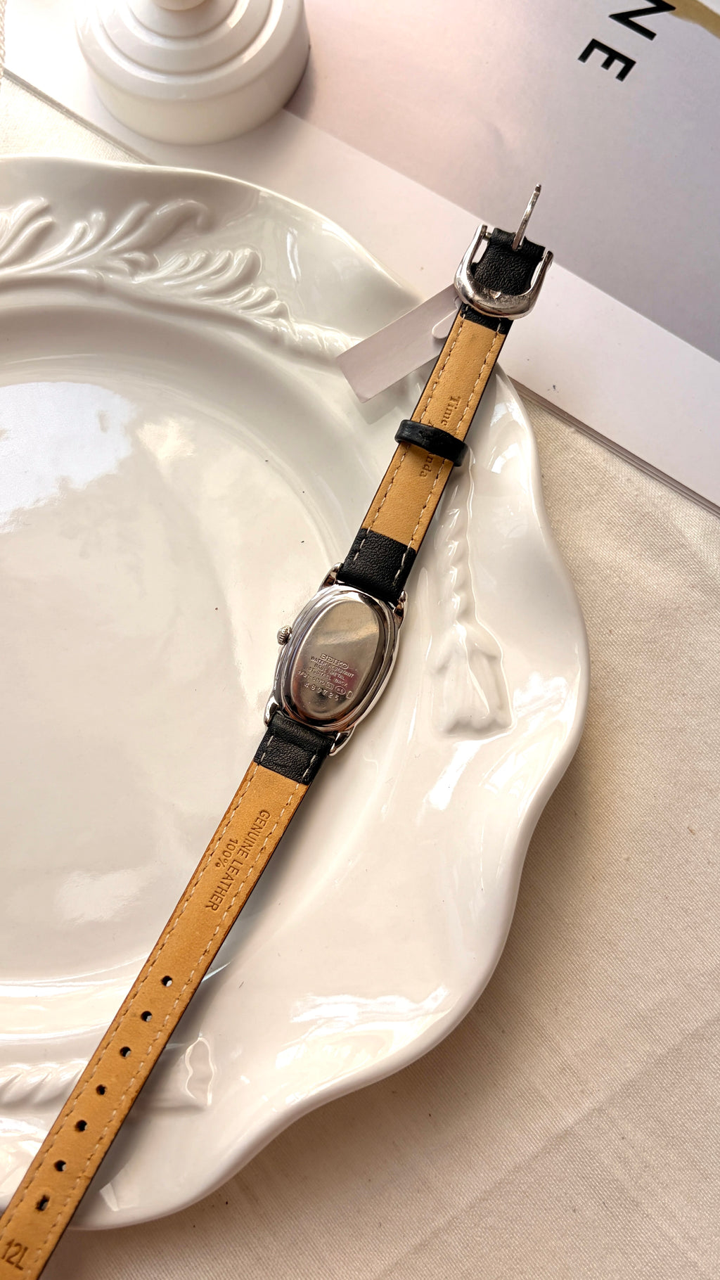 S. Noie White Oval Dial Black Strap Watch