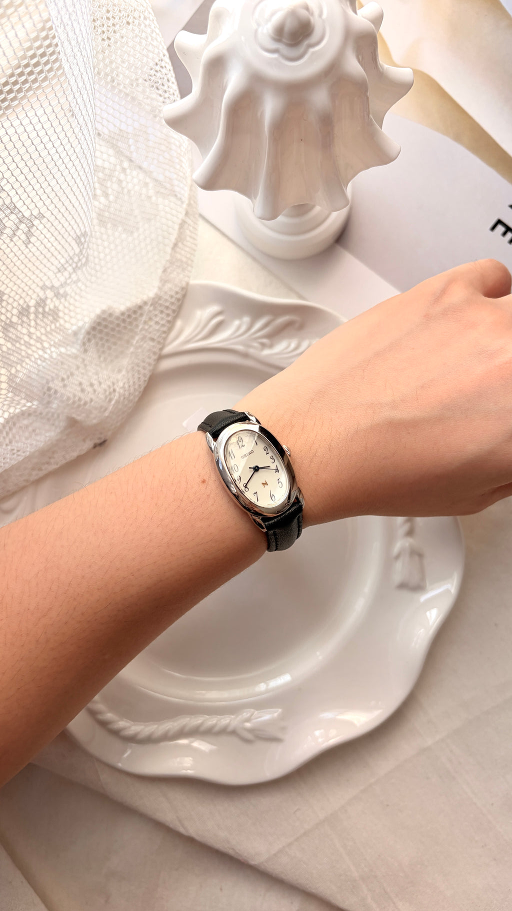 S. Noie White Oval Dial Black Strap Watch