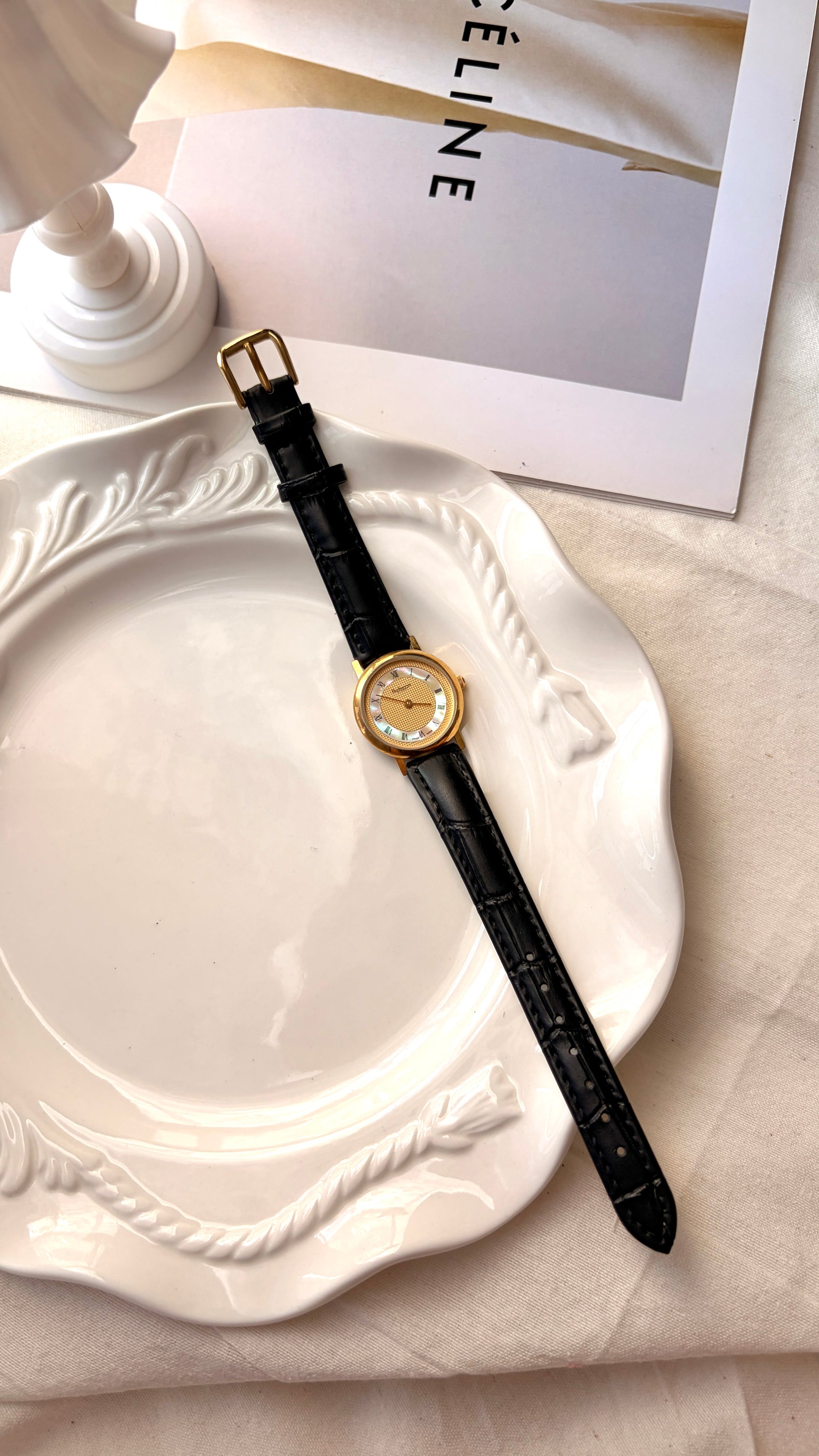 BRBY. Gold & MOP Round Dial Black Strap Watch
