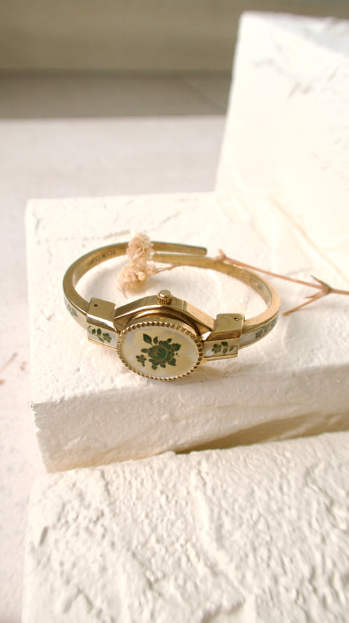 A.M. Beige Blue Floral Pattern Gold Bangle Watch