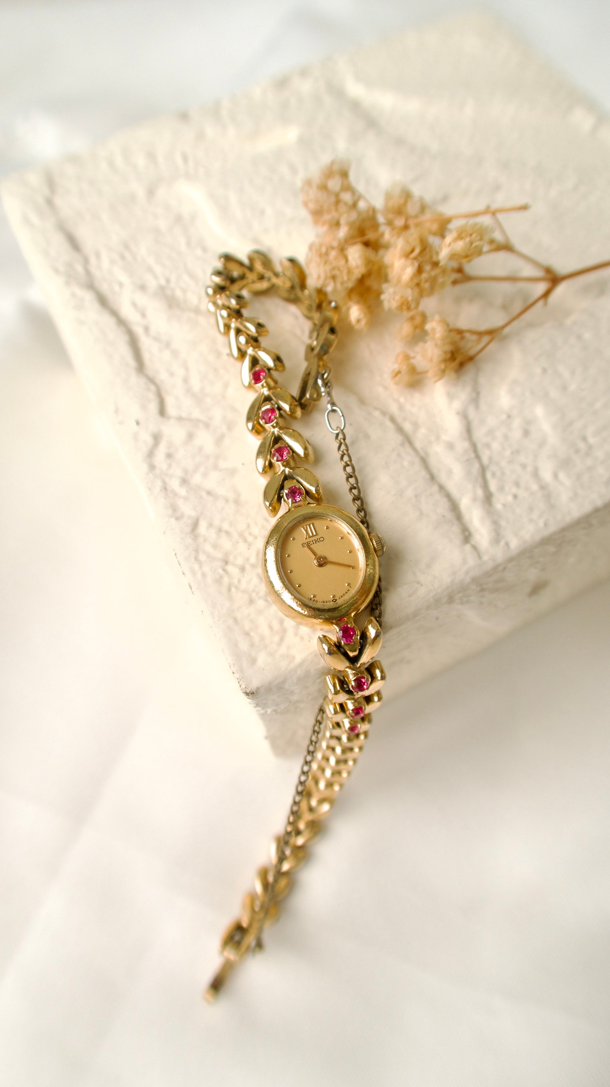 S. Gold Oval Dial with Pink Jewels Gold Chain Watch