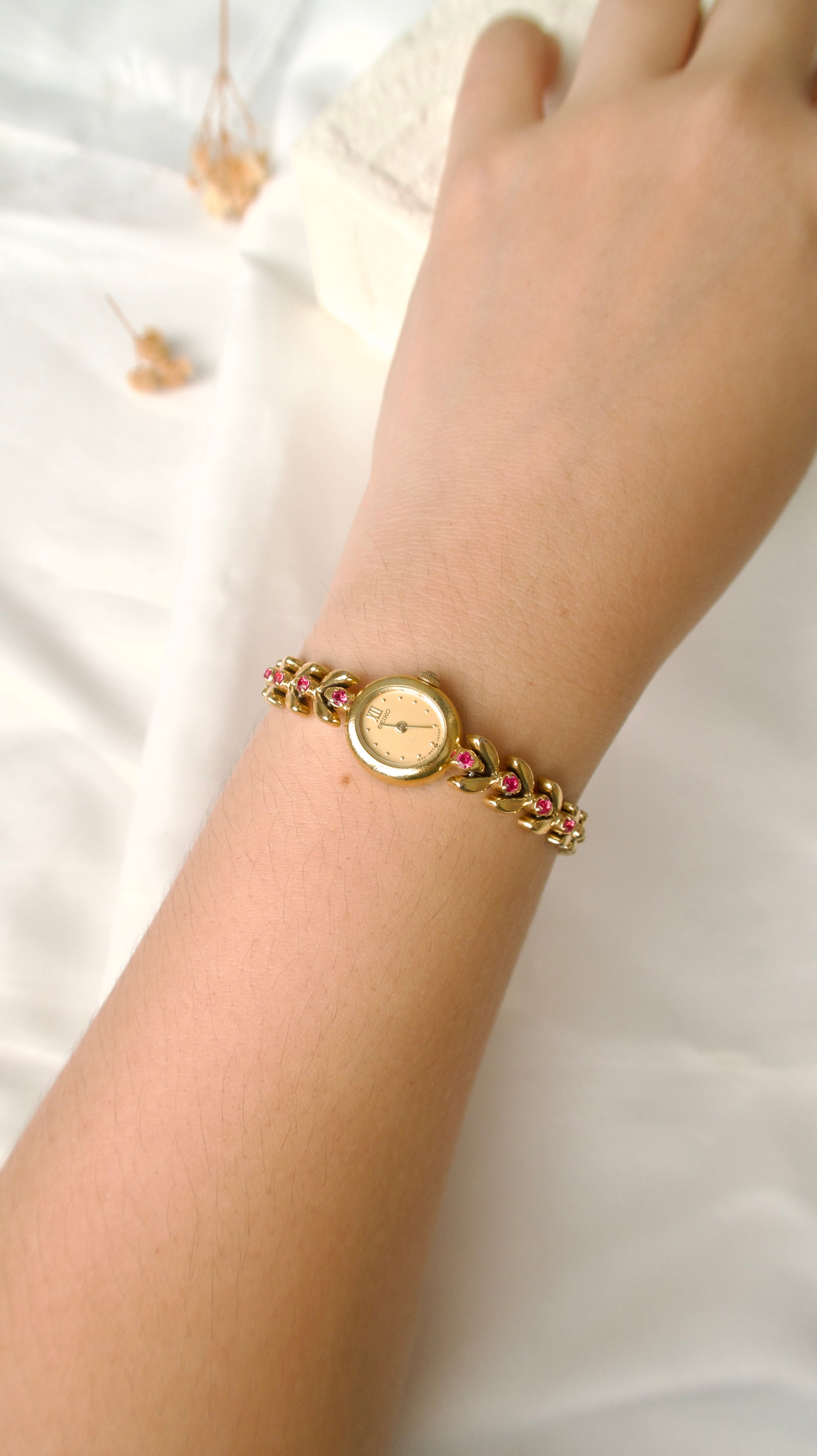 S. Gold Oval Dial with Pink Jewels Gold Chain Watch