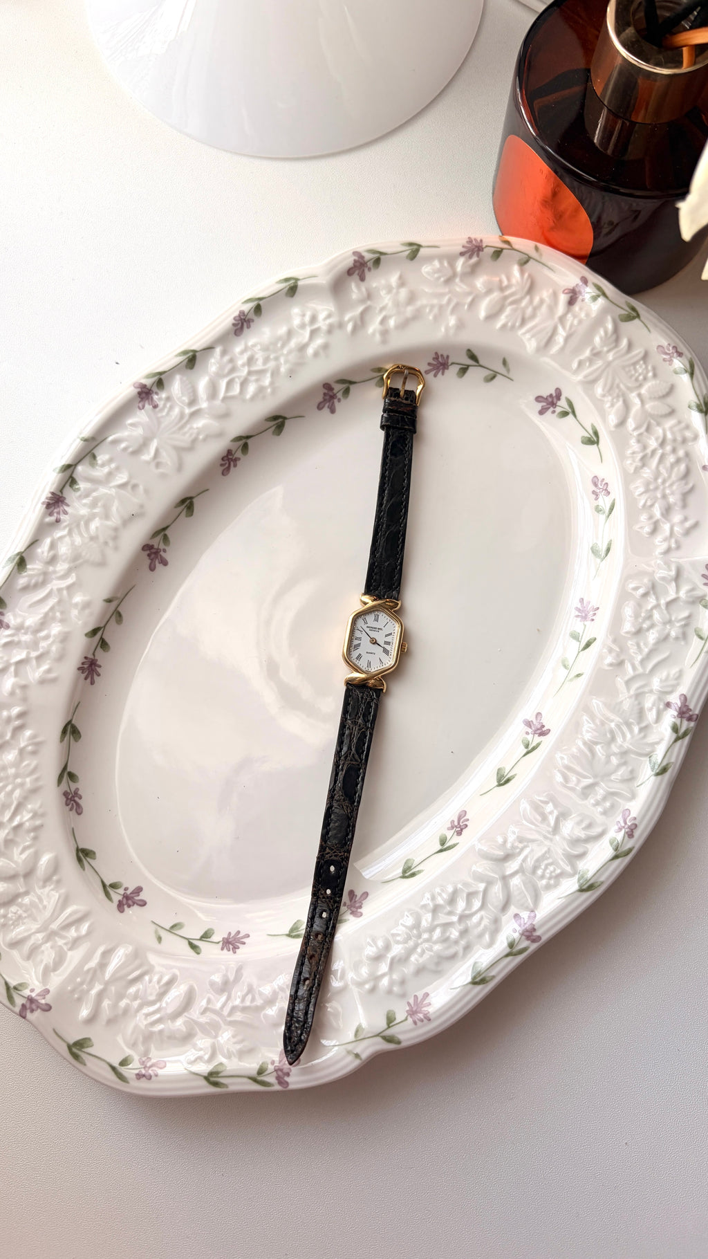 RW. Geneve White Hexagon Roman Dial Black Strap Watch