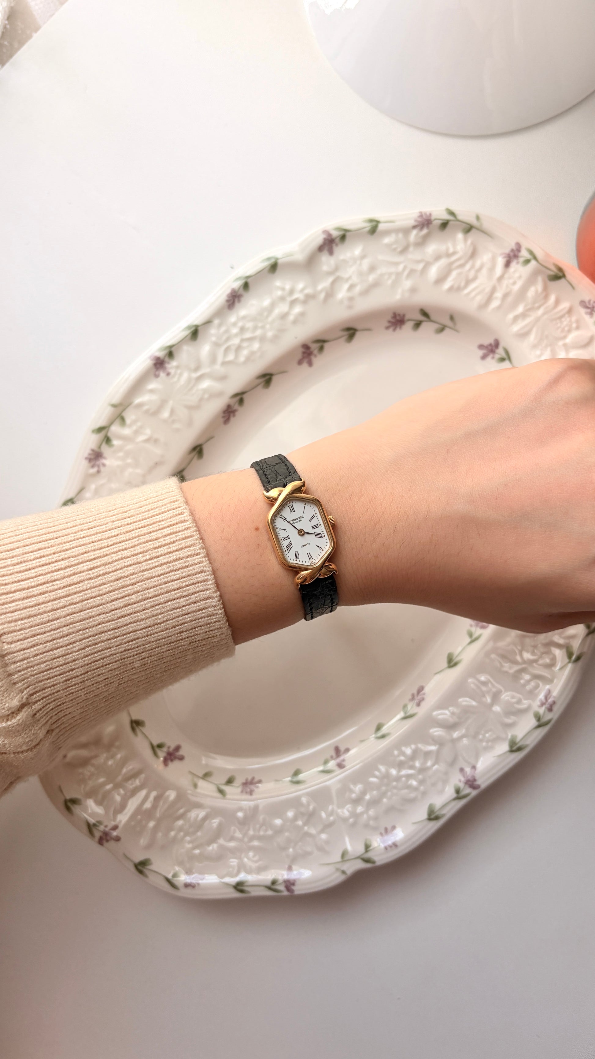 RW. Geneve White Hexagon Roman Dial Black Strap Watch