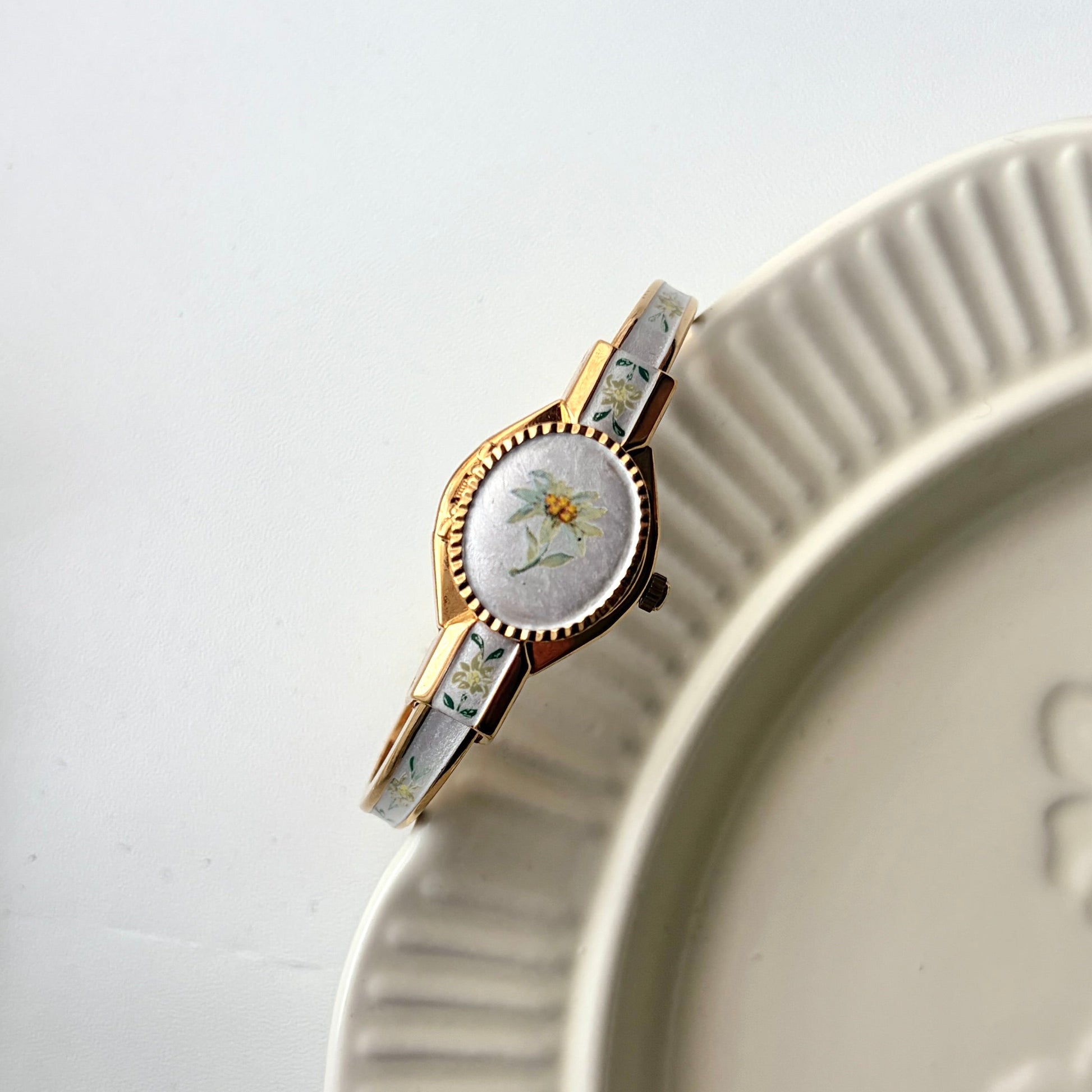 AM. Beige Green Flower Oval Dial with Gold Bangle Watch