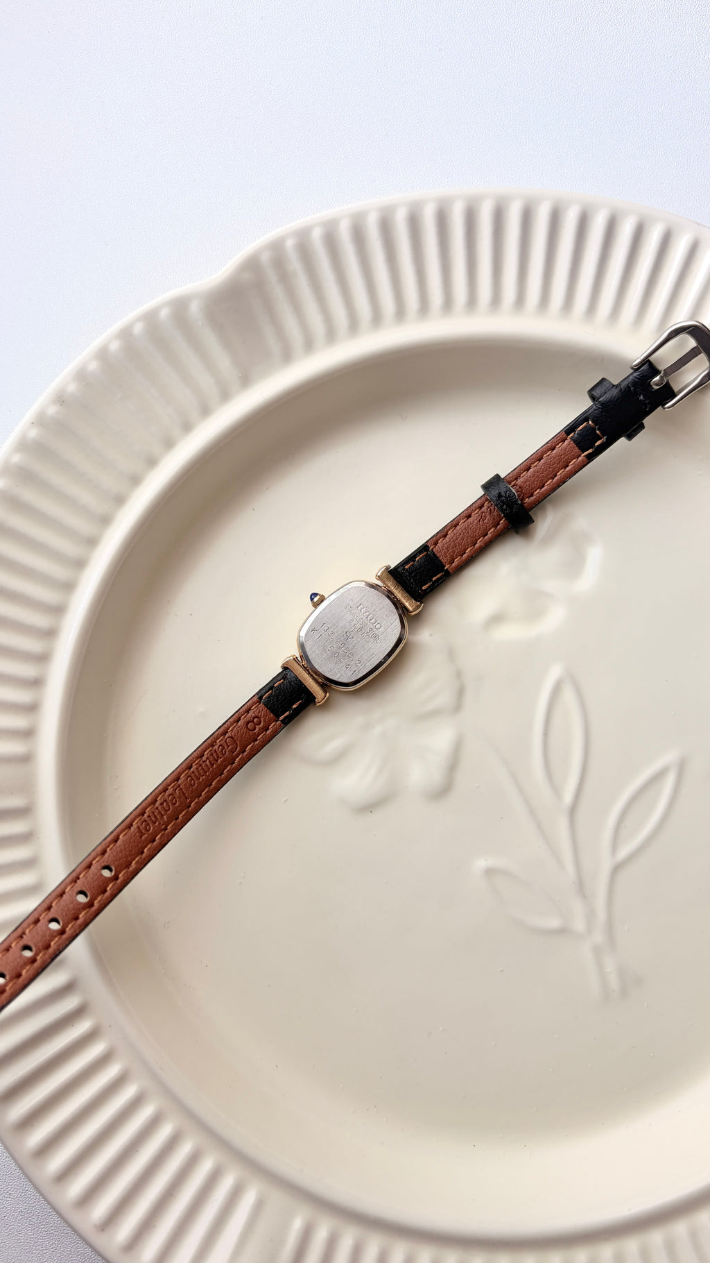 Rd. Gold Oval White Jewel Dial with Black Strap Watch