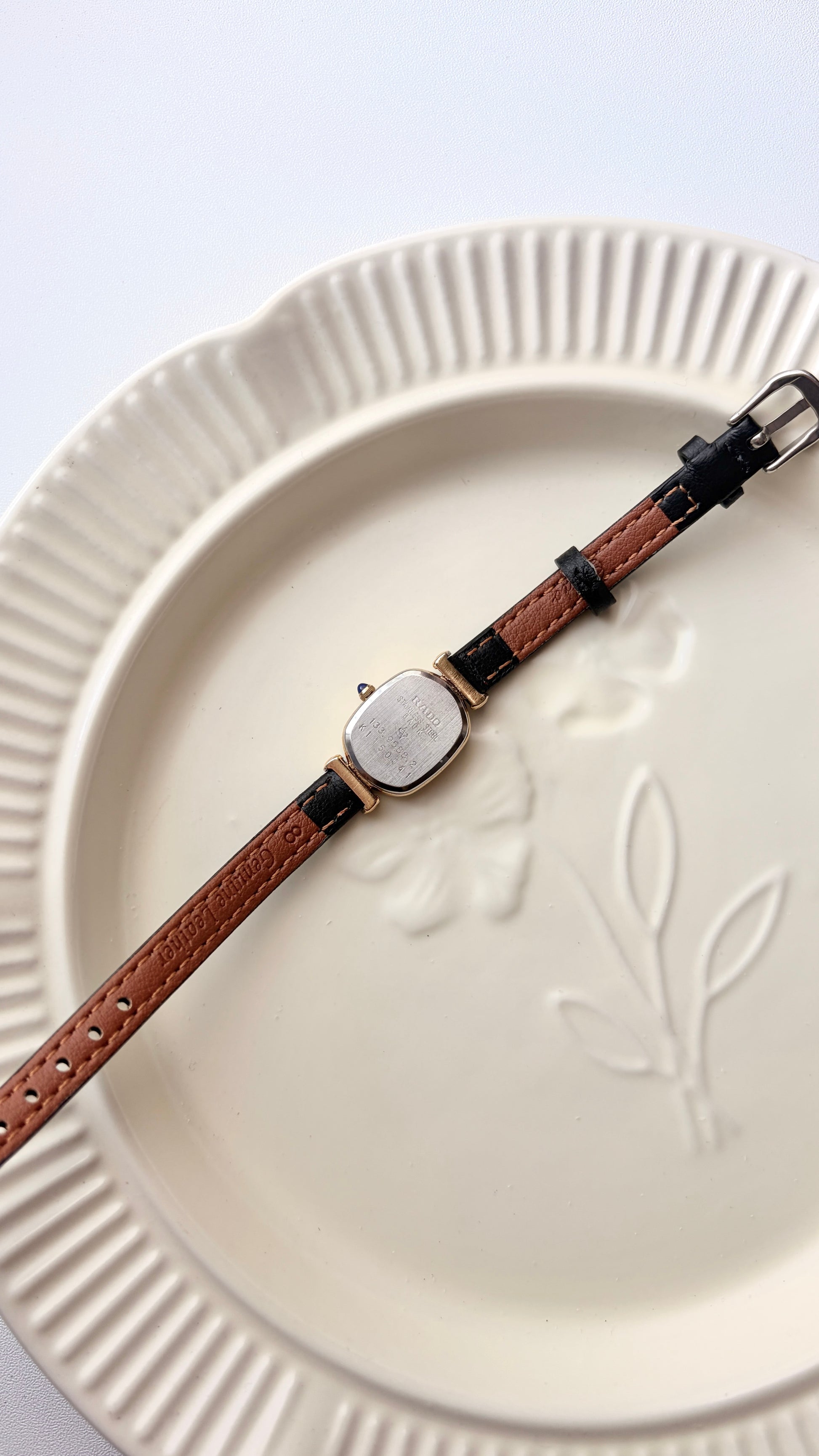 Rd. Gold Oval White Jewel Dial with Black Strap Watch
