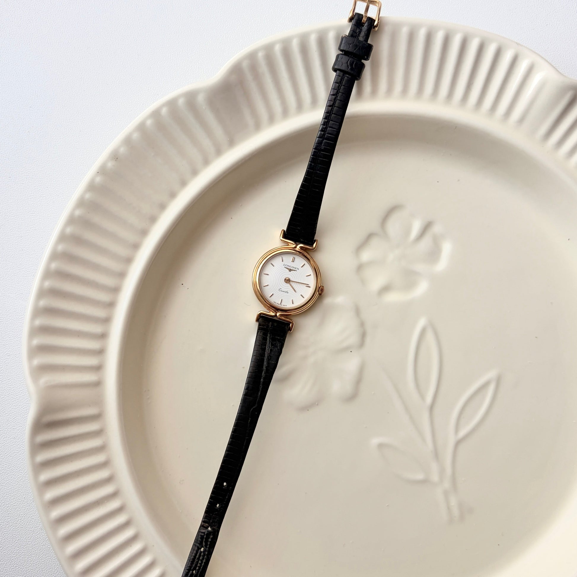 L. White Round Dial with Black Strap Watch