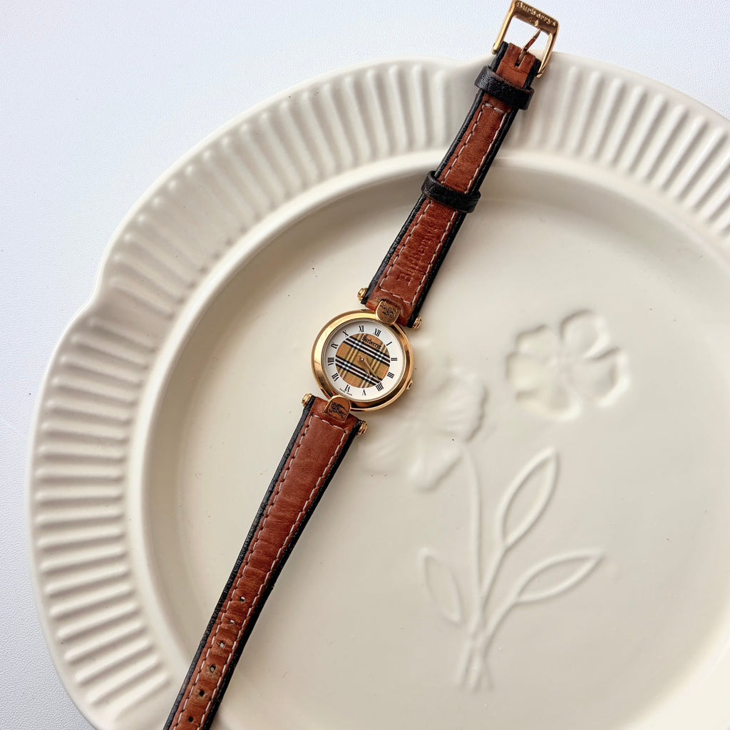 BRBY. White Pattern Round Roman Dial with Brown Strap Watch