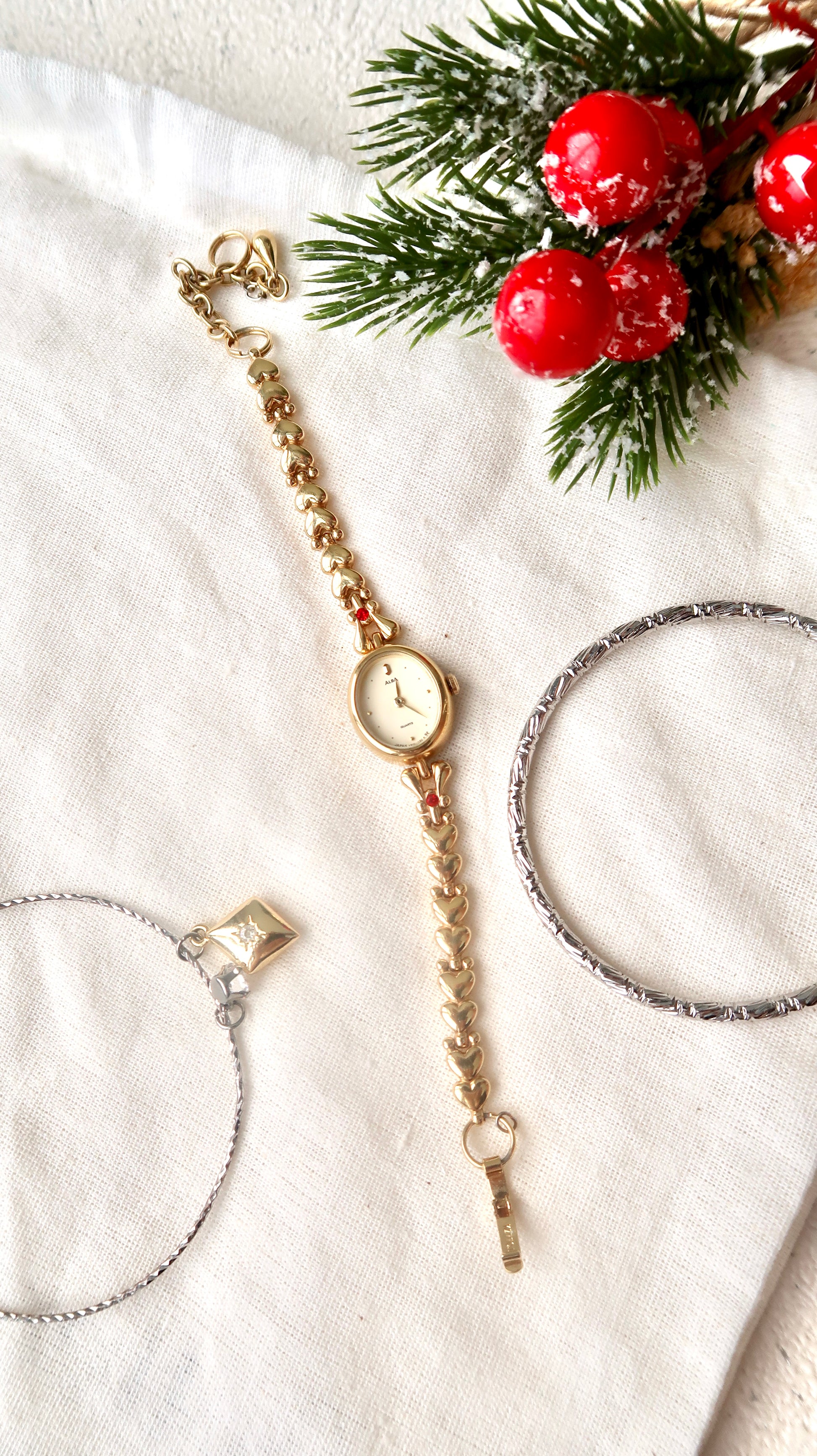 S. Alba Gold Dial Red Jewel Chain Watch