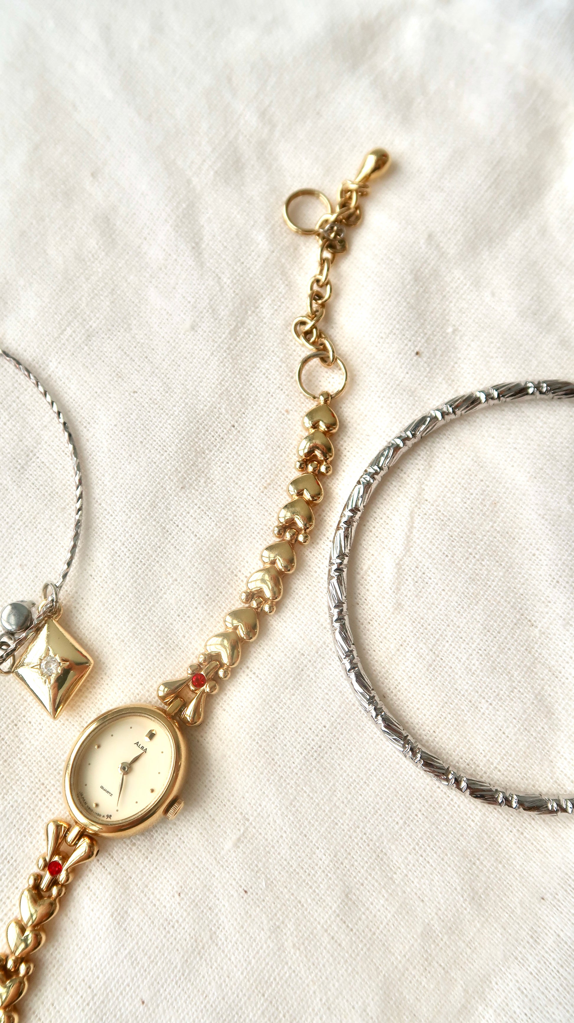 S. Alba Gold Dial Red Jewel Chain Watch