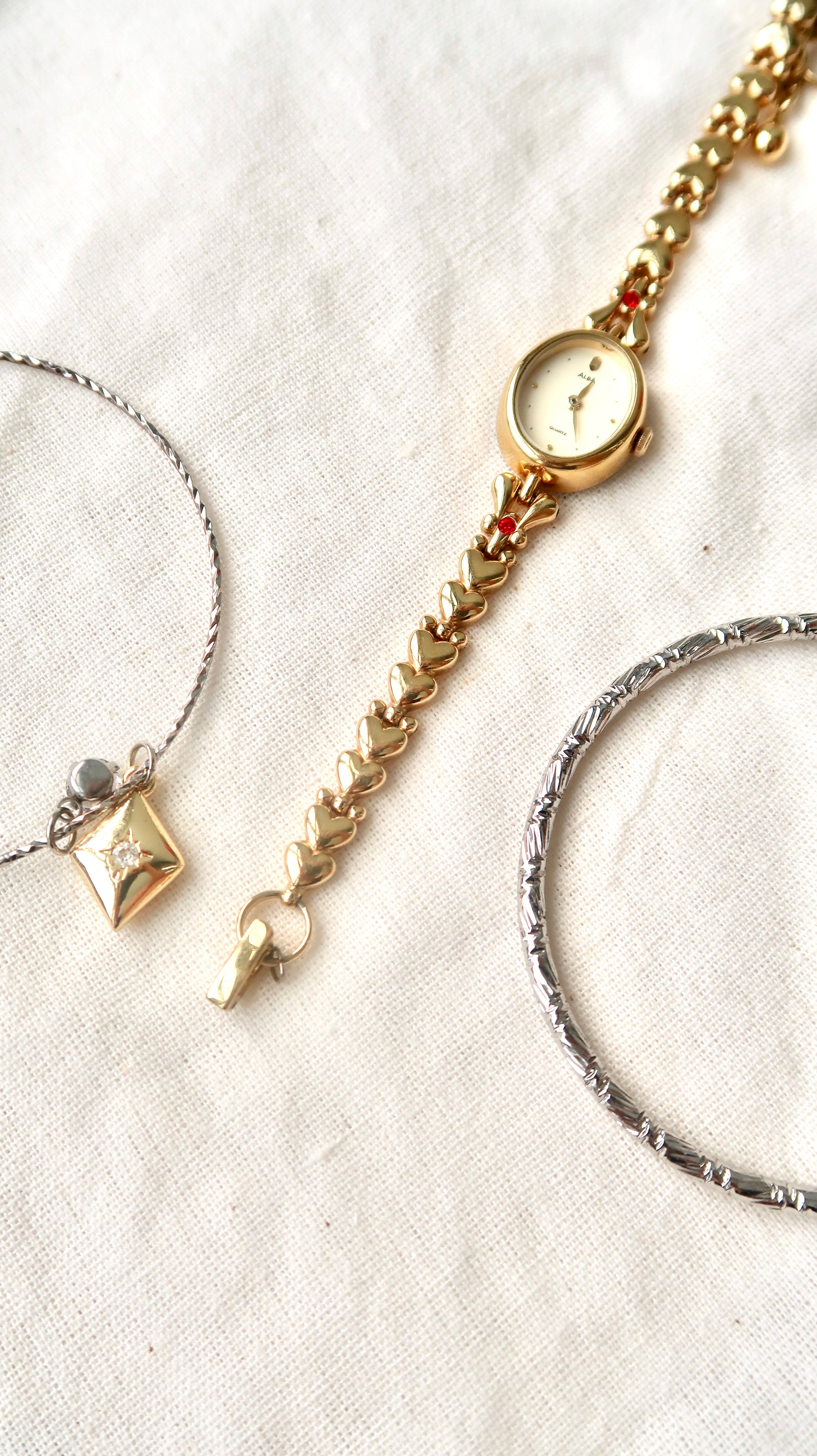 S. Alba Gold Dial Red Jewel Chain Watch