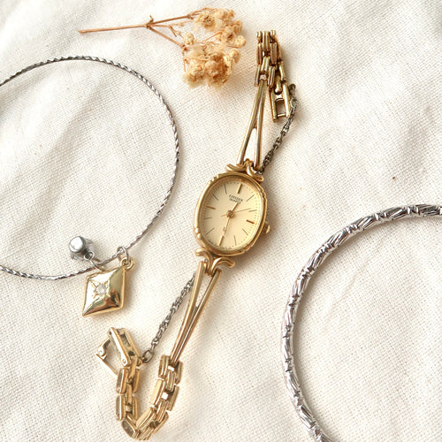 CTZ. Oval Gold Dial with Gold Chain Watch