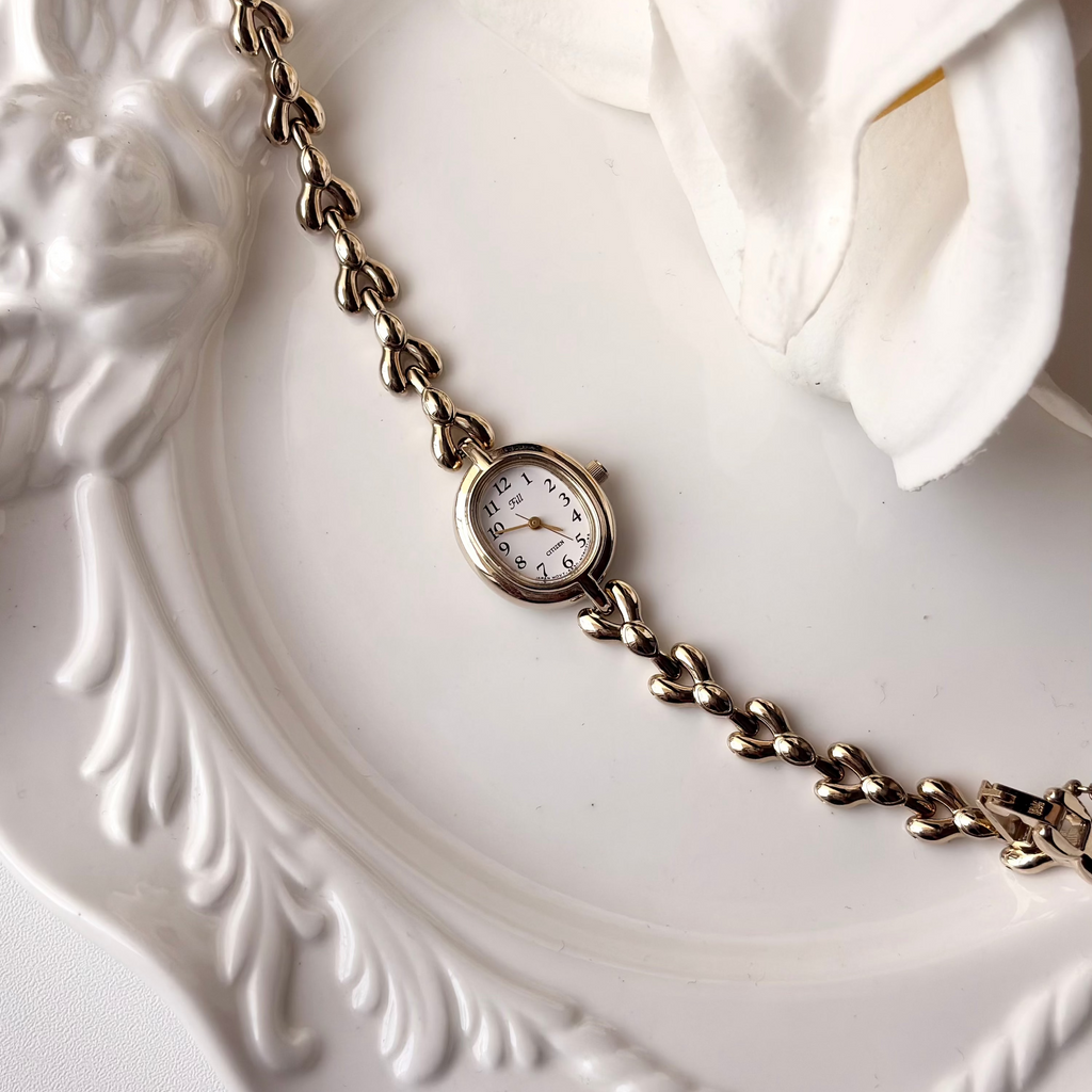 CTZ Fill White Oval Dial Champagne Gold Chain Watch