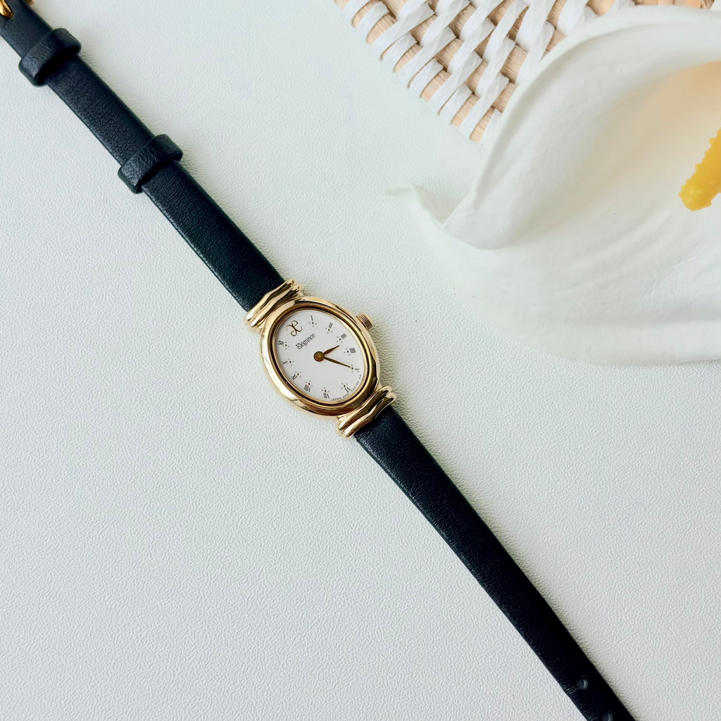 CTZ. Elegance White Oval Roman Dial Black Strap Watch