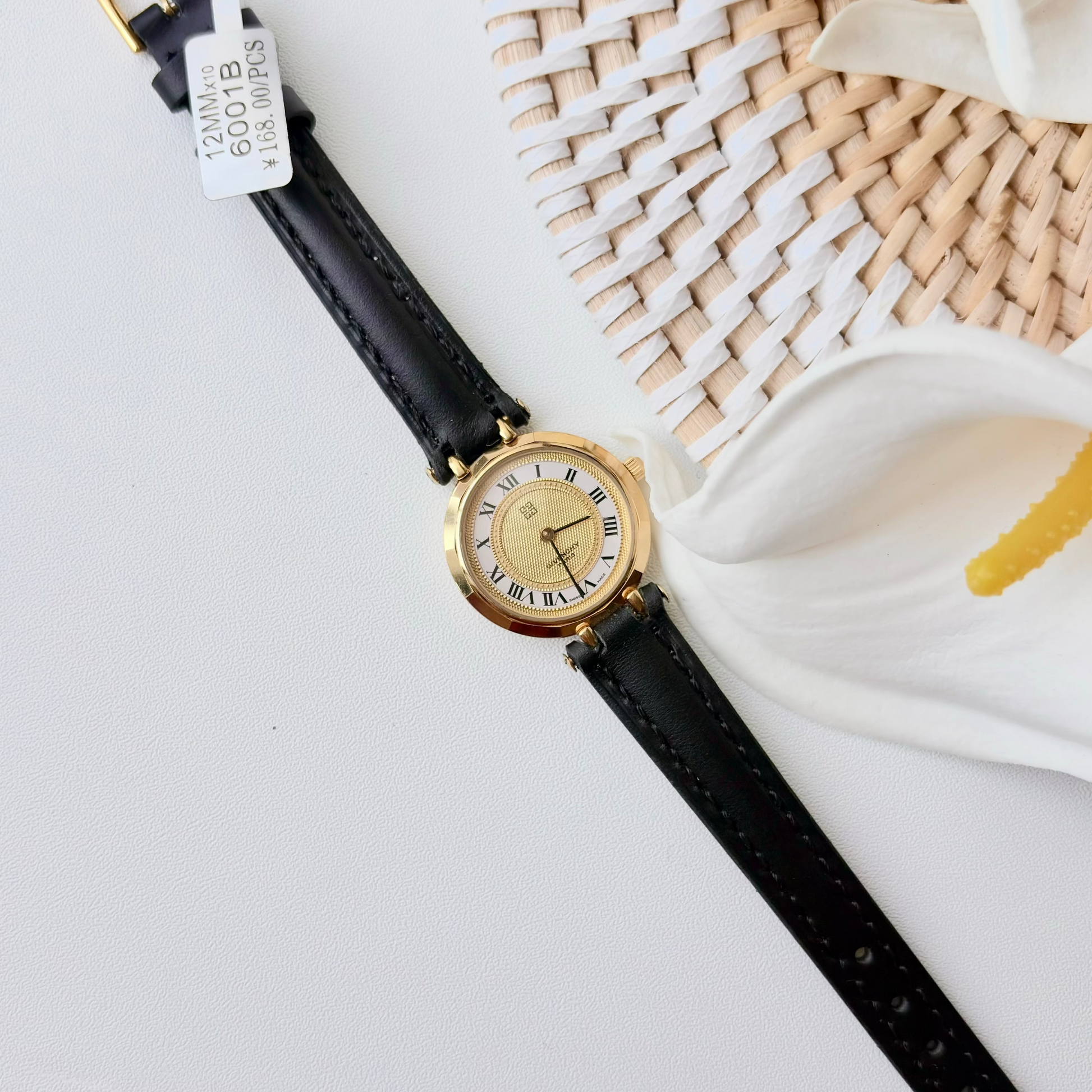 GV. White Gold Round Roman Dial Black Strap Watch