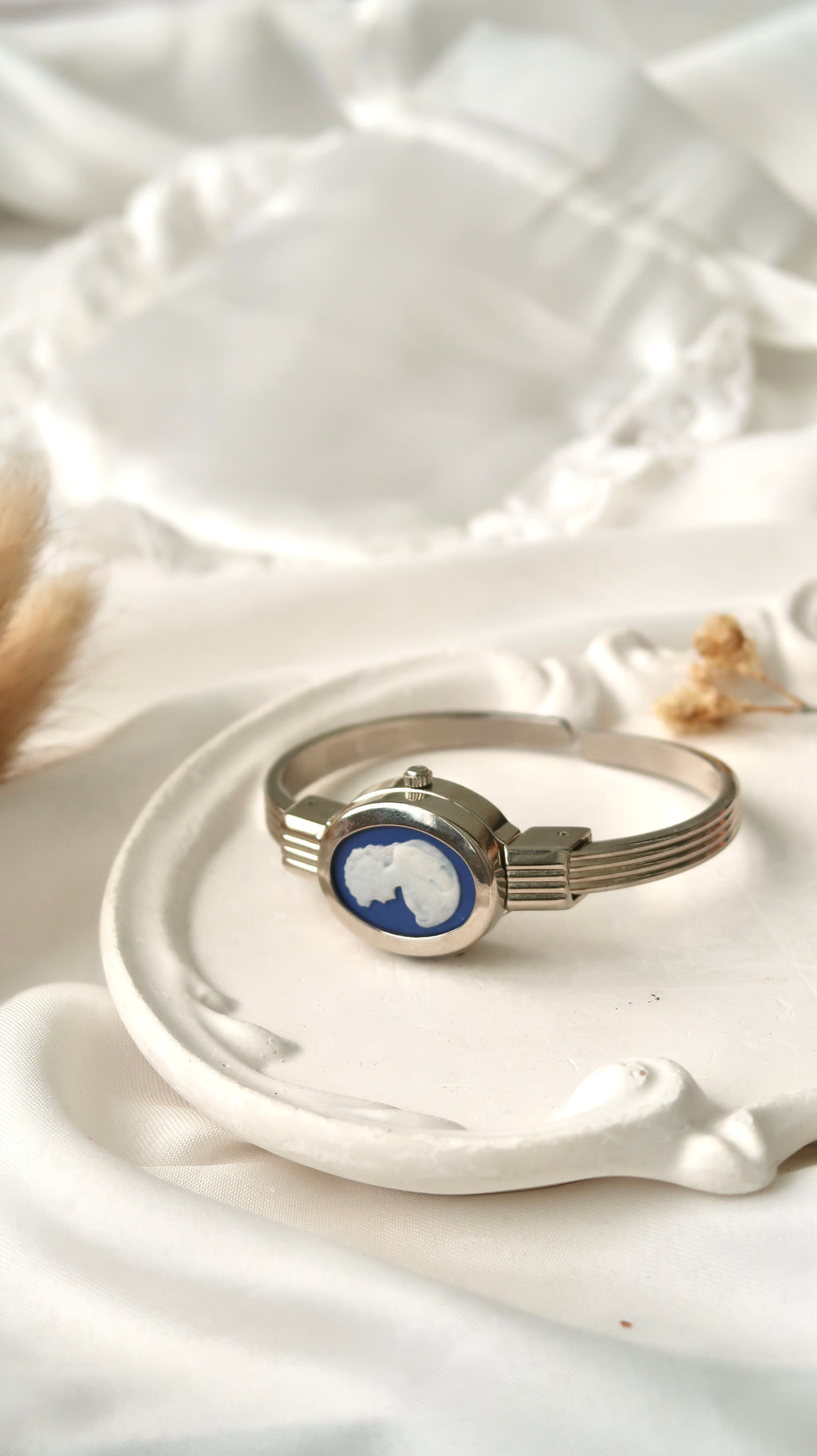 A.M. White Blue Sculpture Silver Bangle Watch