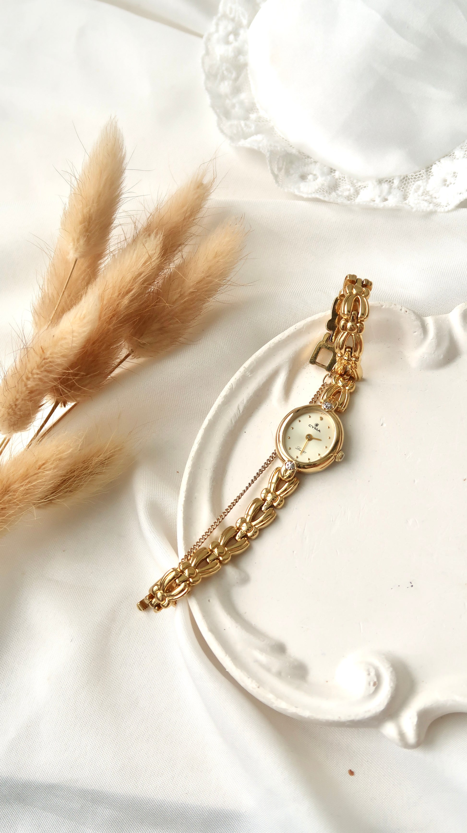 CY. Beige Oval 2P Diamond with Gold Chain Watch